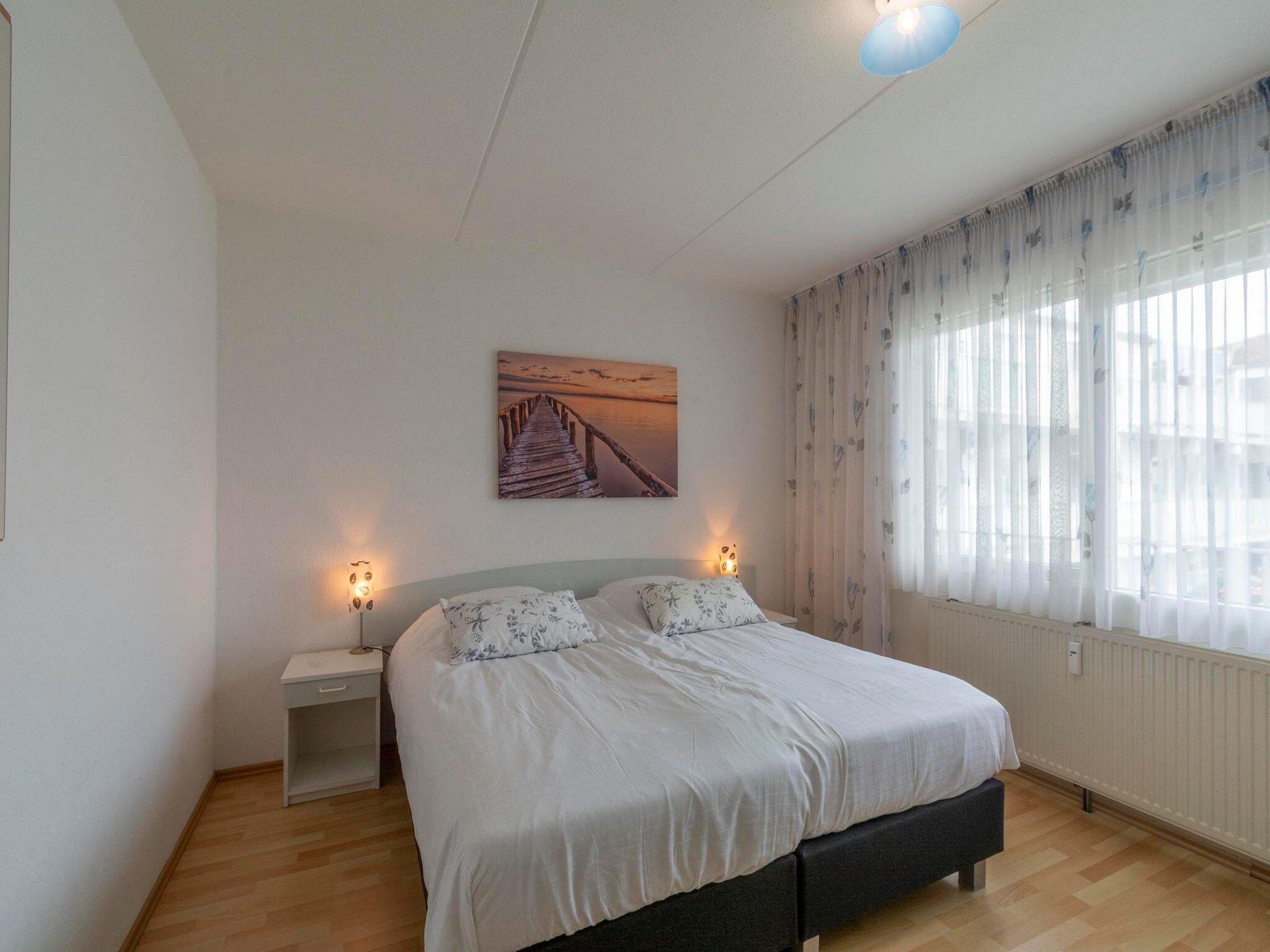 Een slaapkamer van Beach Appartement 29 in Callantsoog