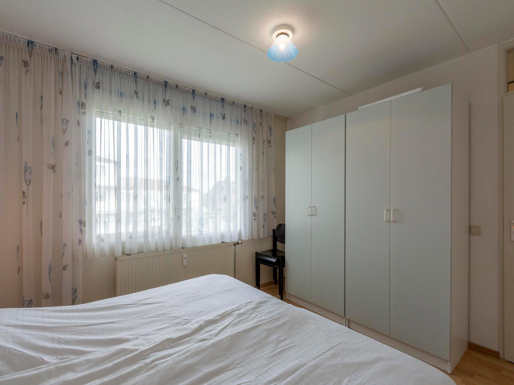 Een slaapkamer van Beach Appartement 29 in Callantsoog