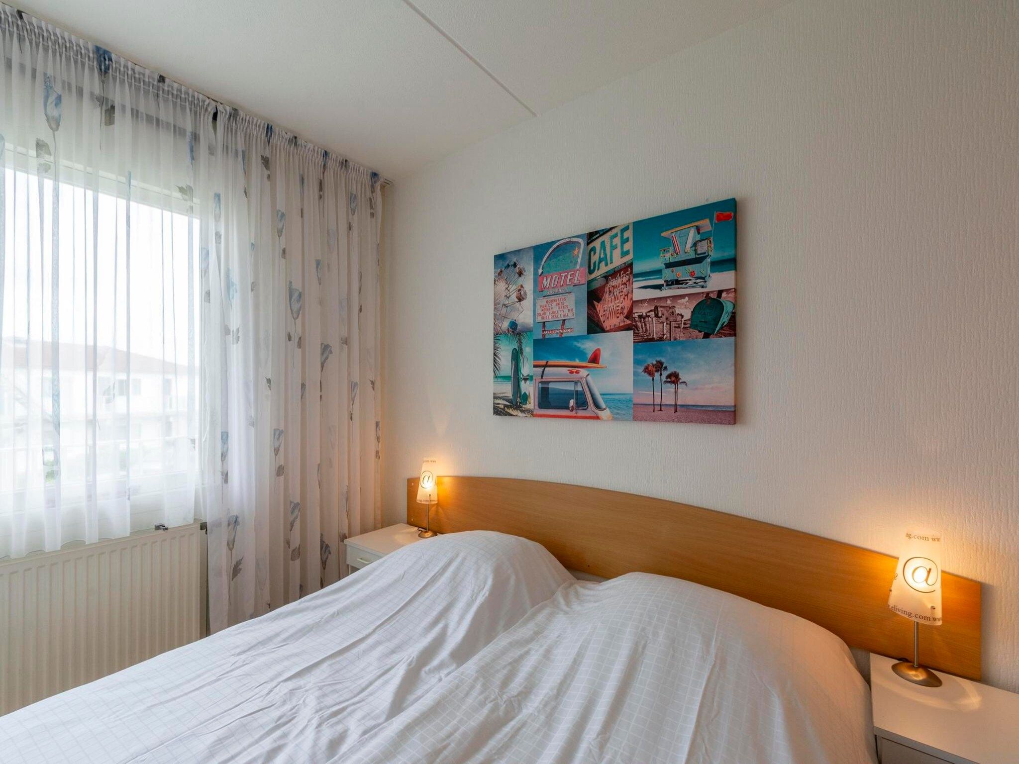 Een slaapkamer van Beach Appartement 29 in Callantsoog