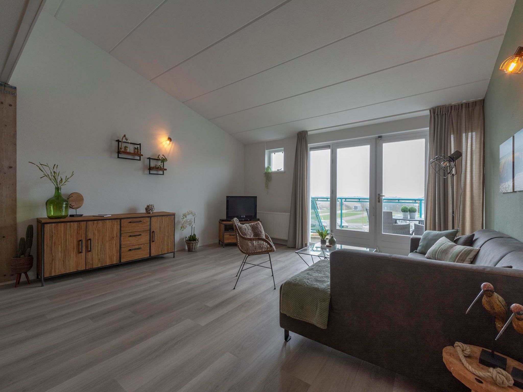 De woonkamer van Strandslag 203 in Julianadorp aan Zee