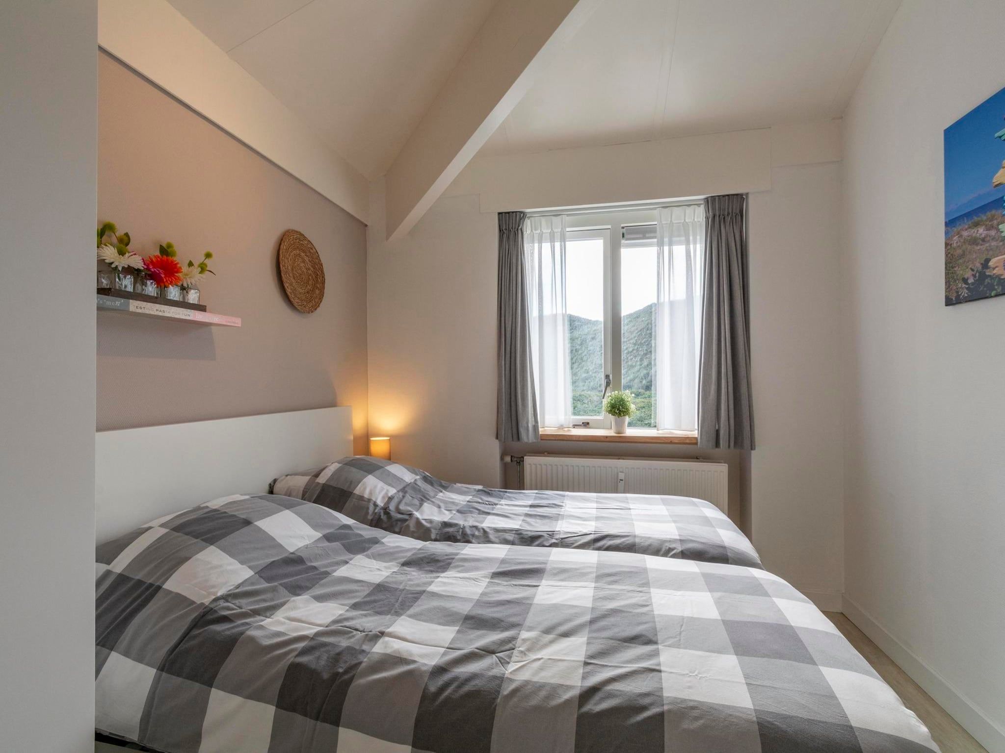 Een slaapkamer van Beach Appartement 36 in Callantsoog