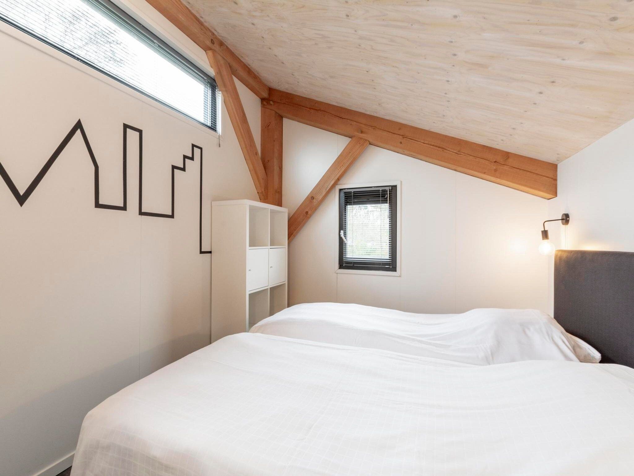 Een slaapkamer van Duinvink in Sint Maartenszee