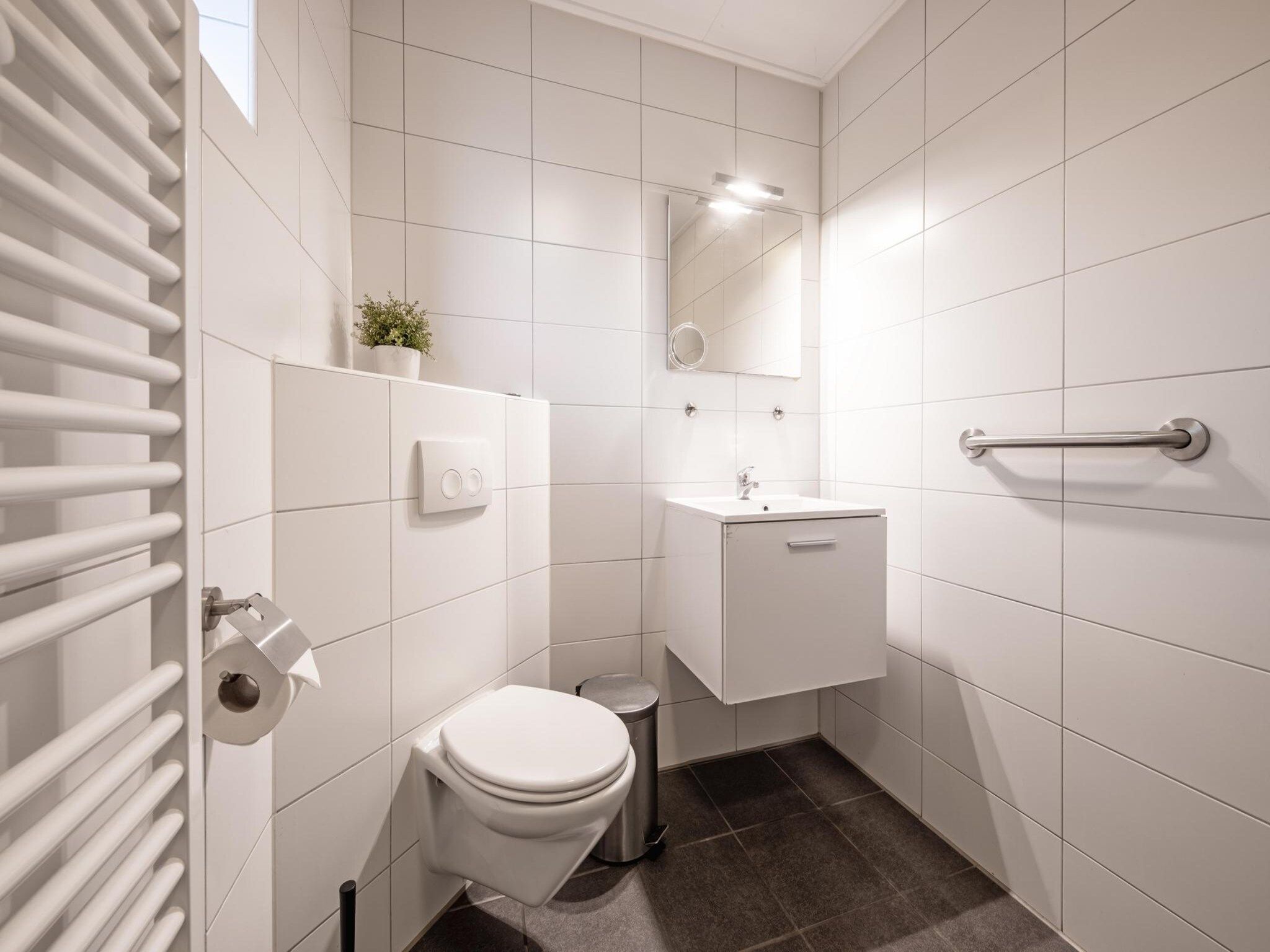 De badkamer van Strandhuys Oester in De Koog