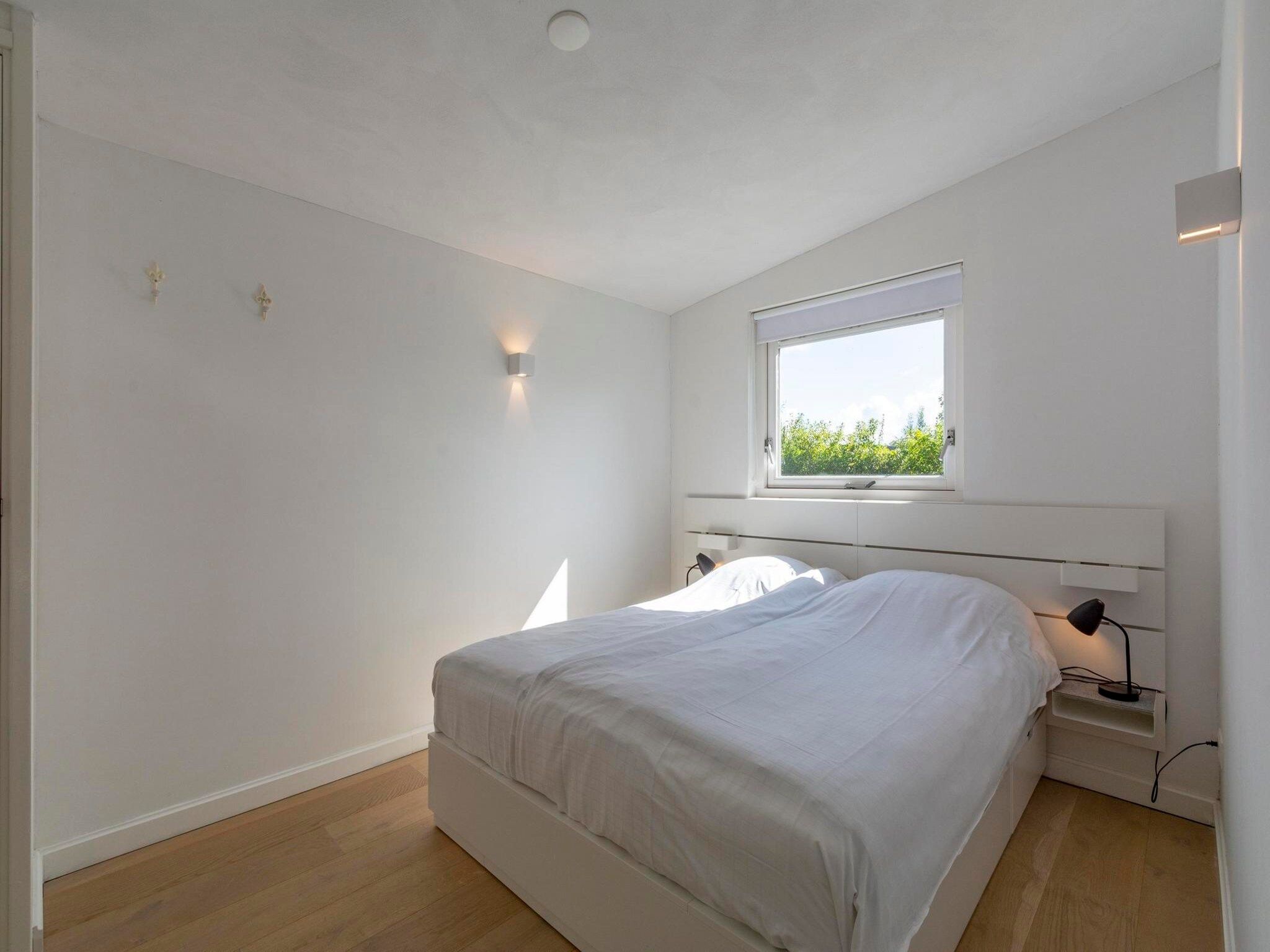 Een slaapkamer van Eureka 109 in Sint Maartensvlotbrug