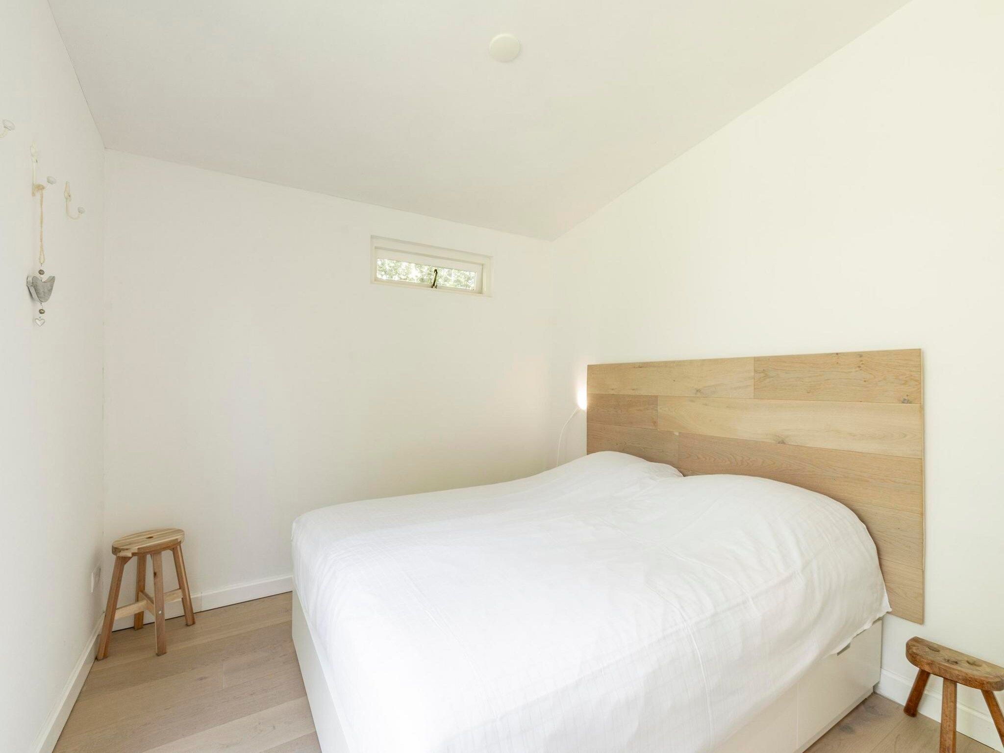 Een slaapkamer van Eureka 109 in Sint Maartensvlotbrug