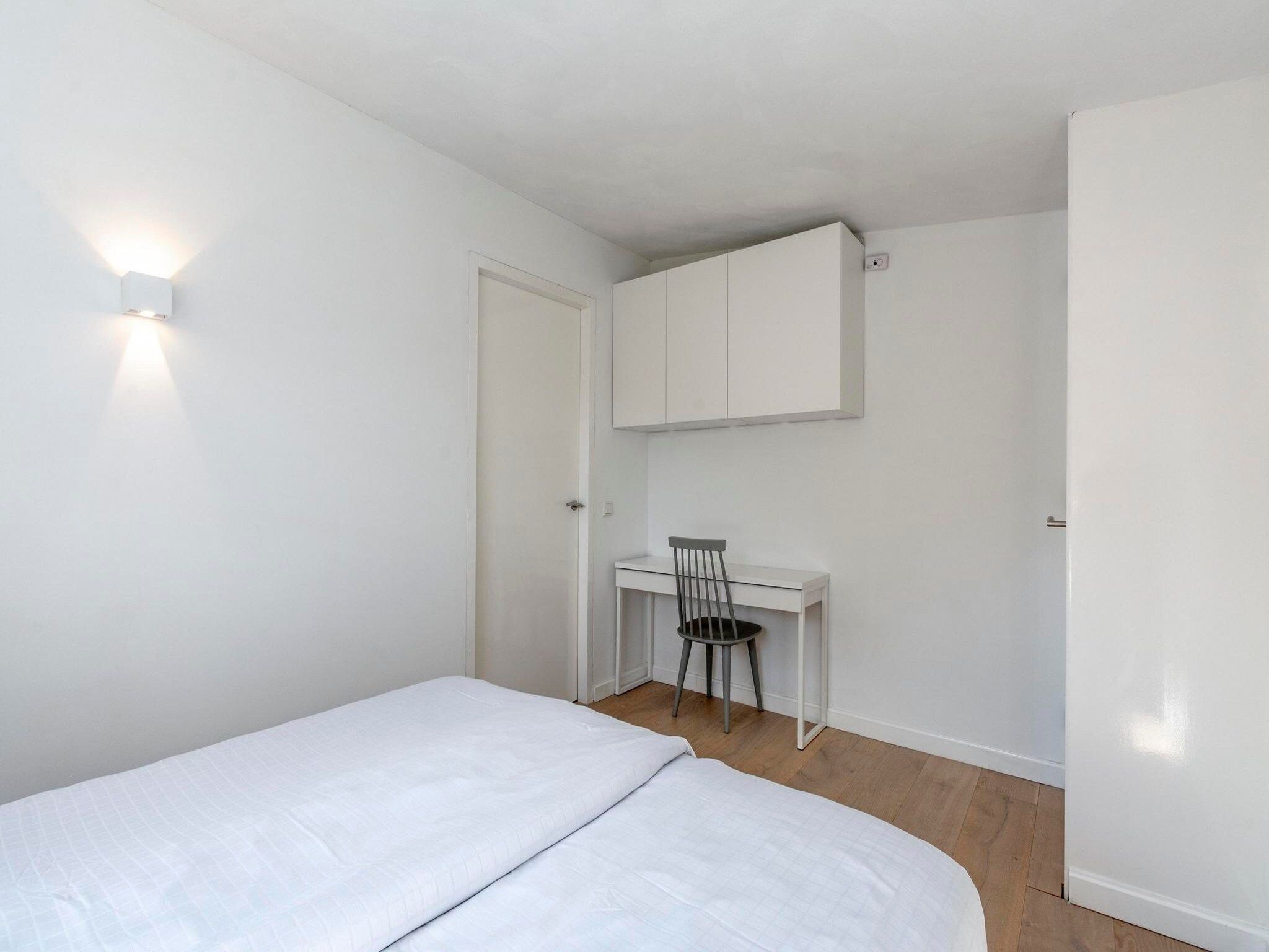 Een slaapkamer van Eureka 109 in Sint Maartensvlotbrug