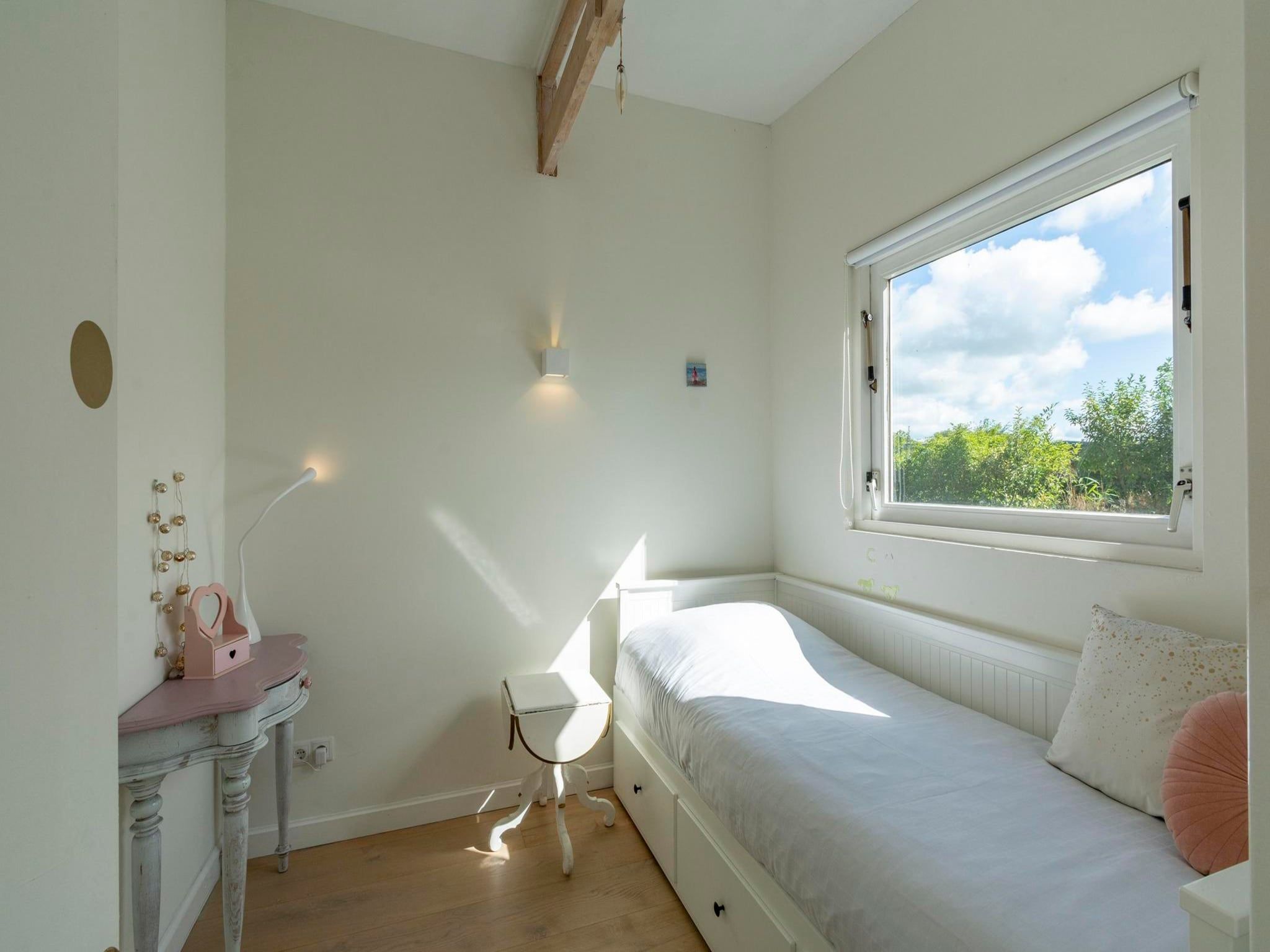 Een slaapkamer van Eureka 109 in Sint Maartensvlotbrug