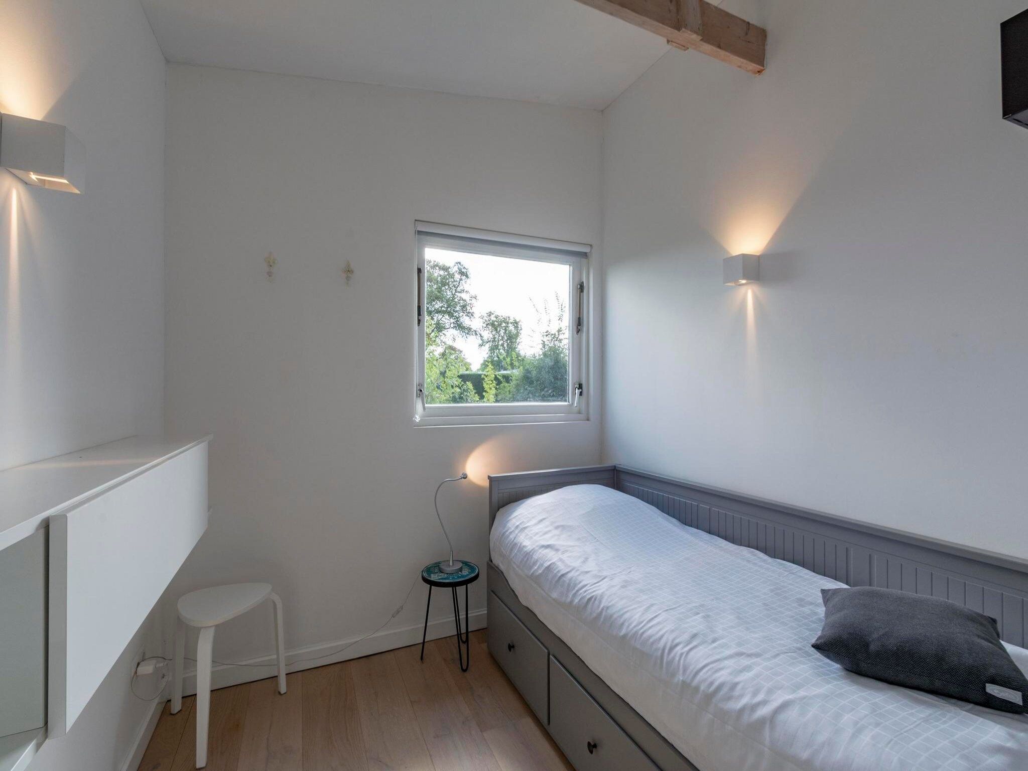 Een slaapkamer van Eureka 109 in Sint Maartensvlotbrug