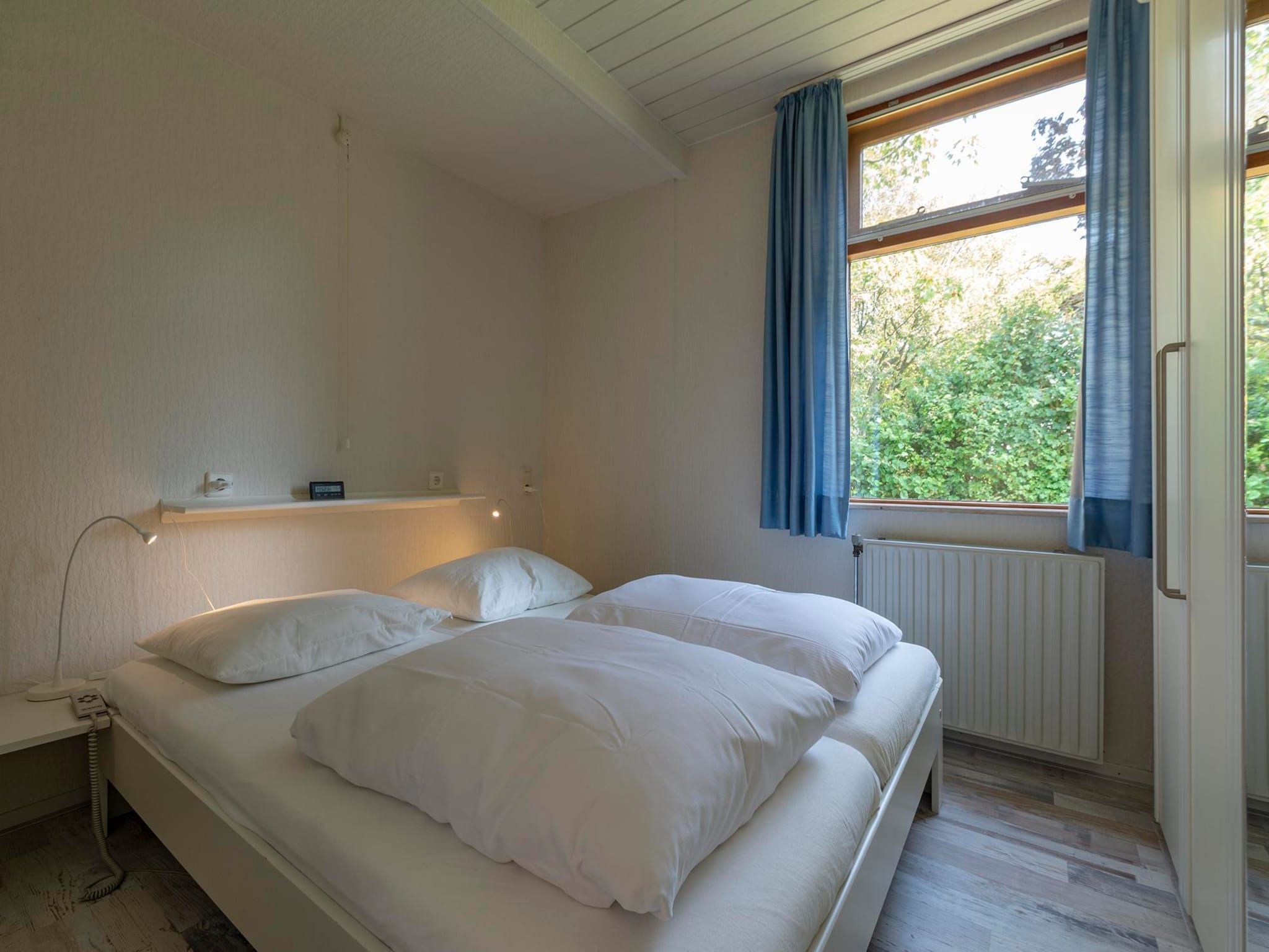 Een slaapkamer van Eureka 78 in Sint Maartensvlotbrug