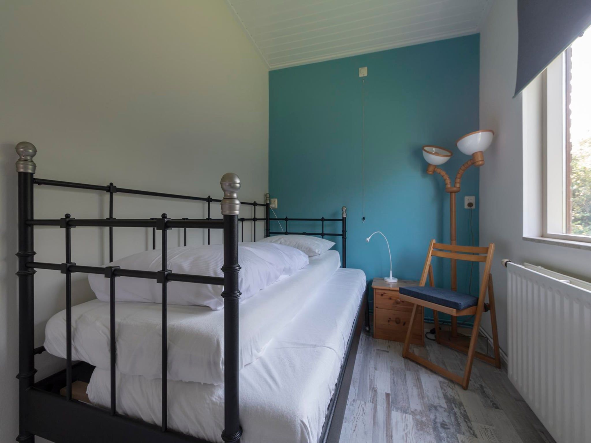 Een slaapkamer van Eureka 78 in Sint Maartensvlotbrug