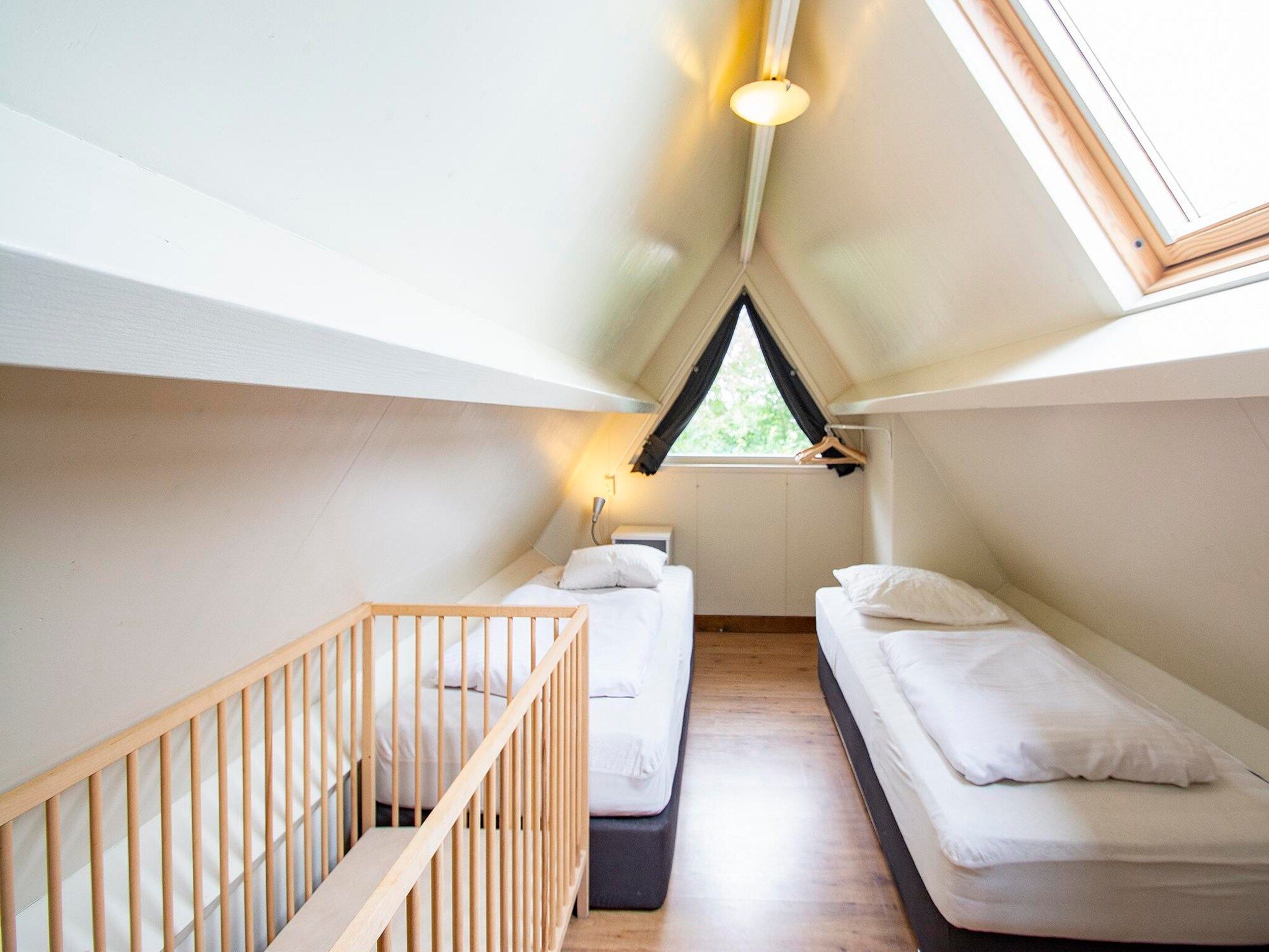 Een slaapkamer van Sandepark 151 Villa Matisse in Callantsoog