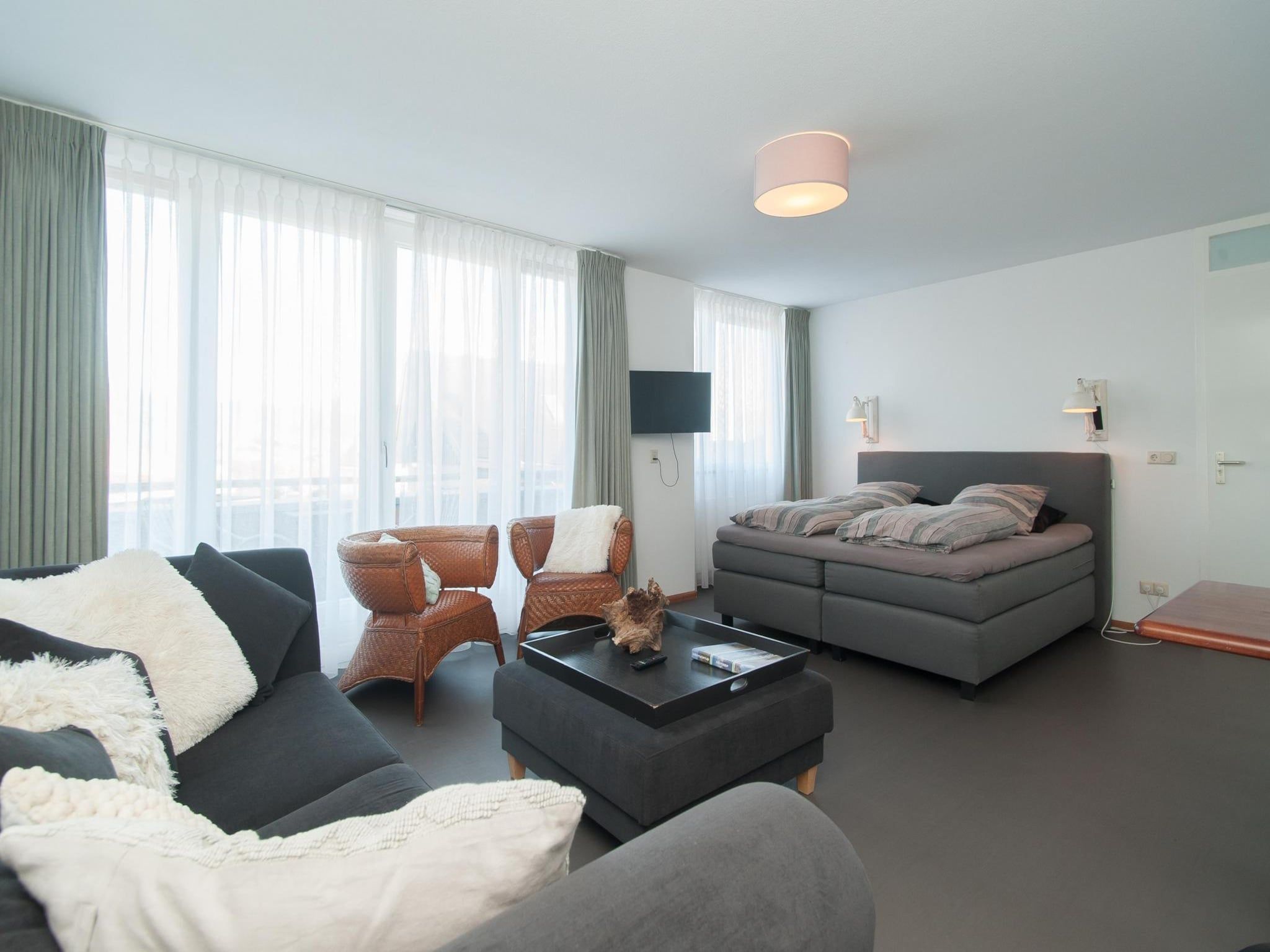 Een slaapkamer van Suite Duinzicht in Callantsoog