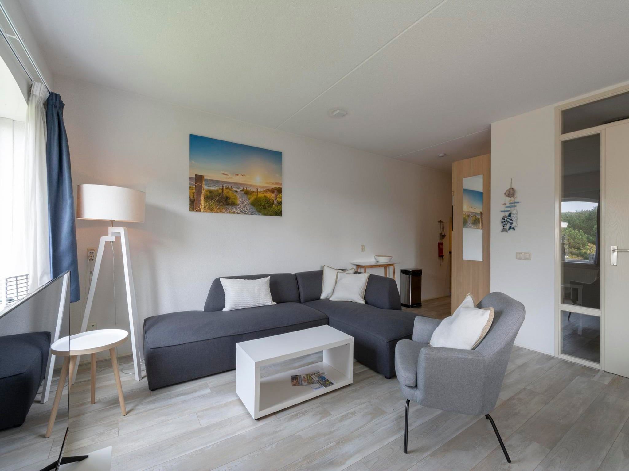 De woonkamer van Résidence Juliana 58 in Julianadorp aan Zee