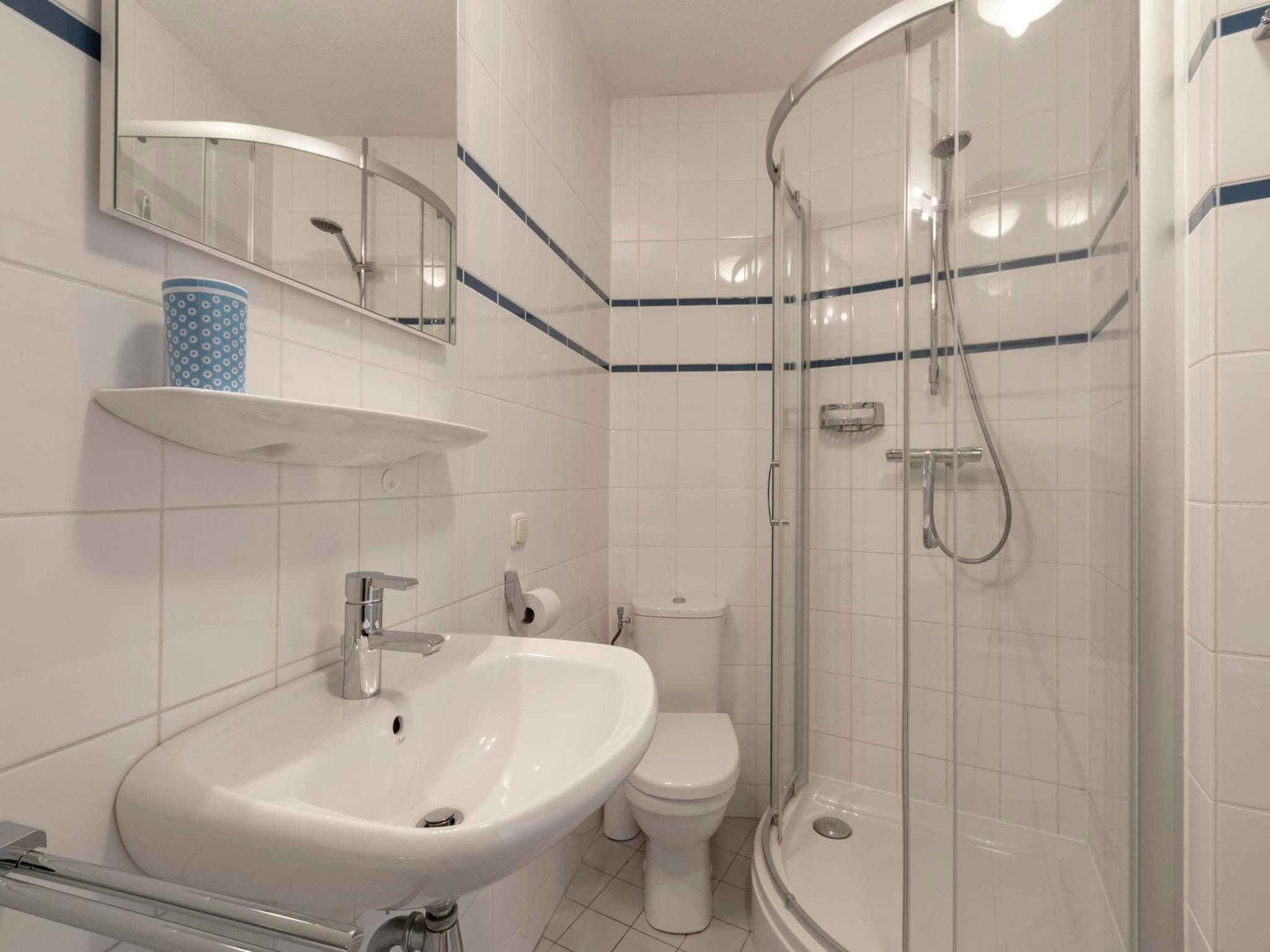 De badkamer van Résidence Juliana 58 in Julianadorp aan Zee