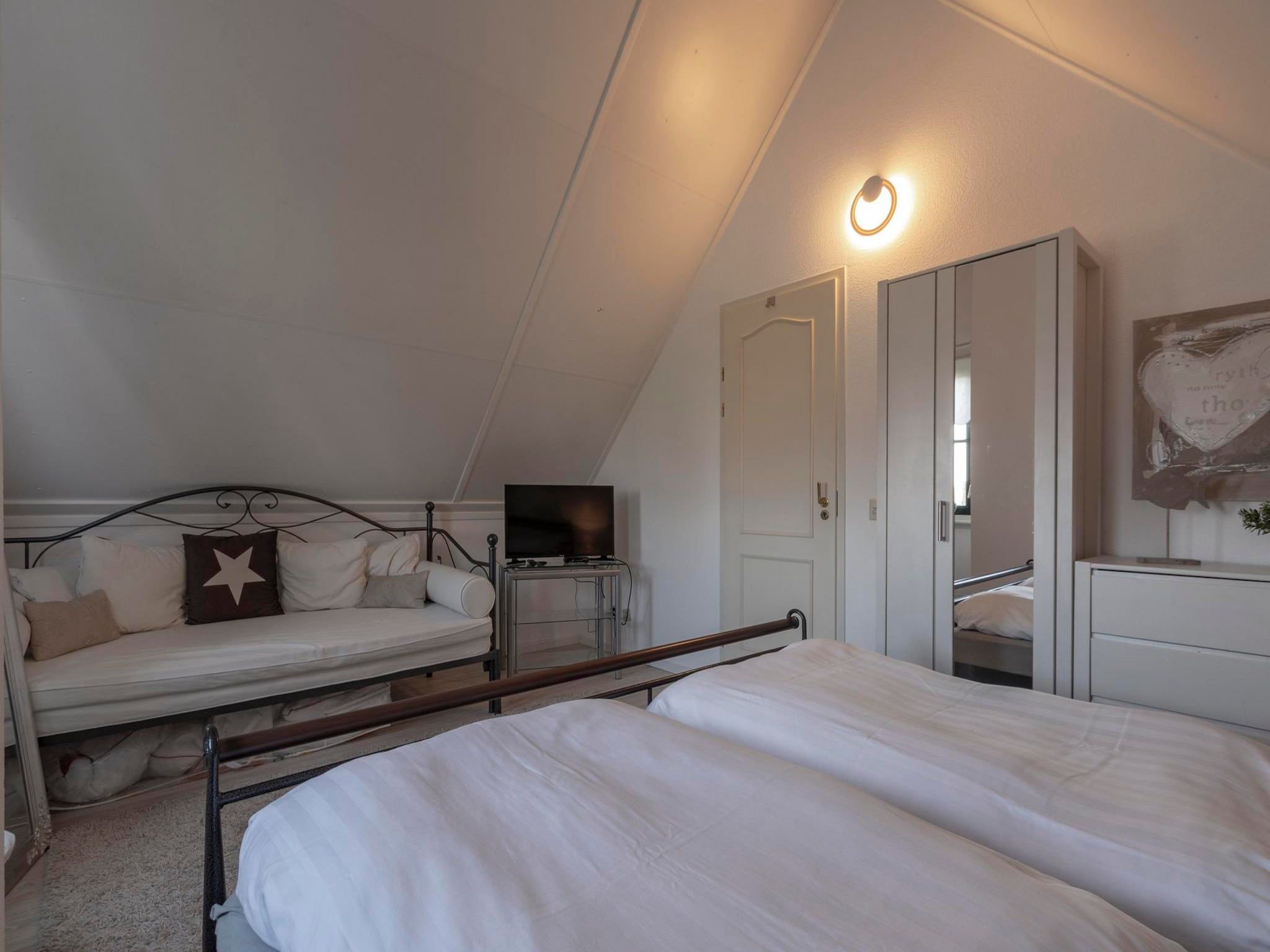 Een slaapkamer van De Buitenplaats 37 in Callantsoog