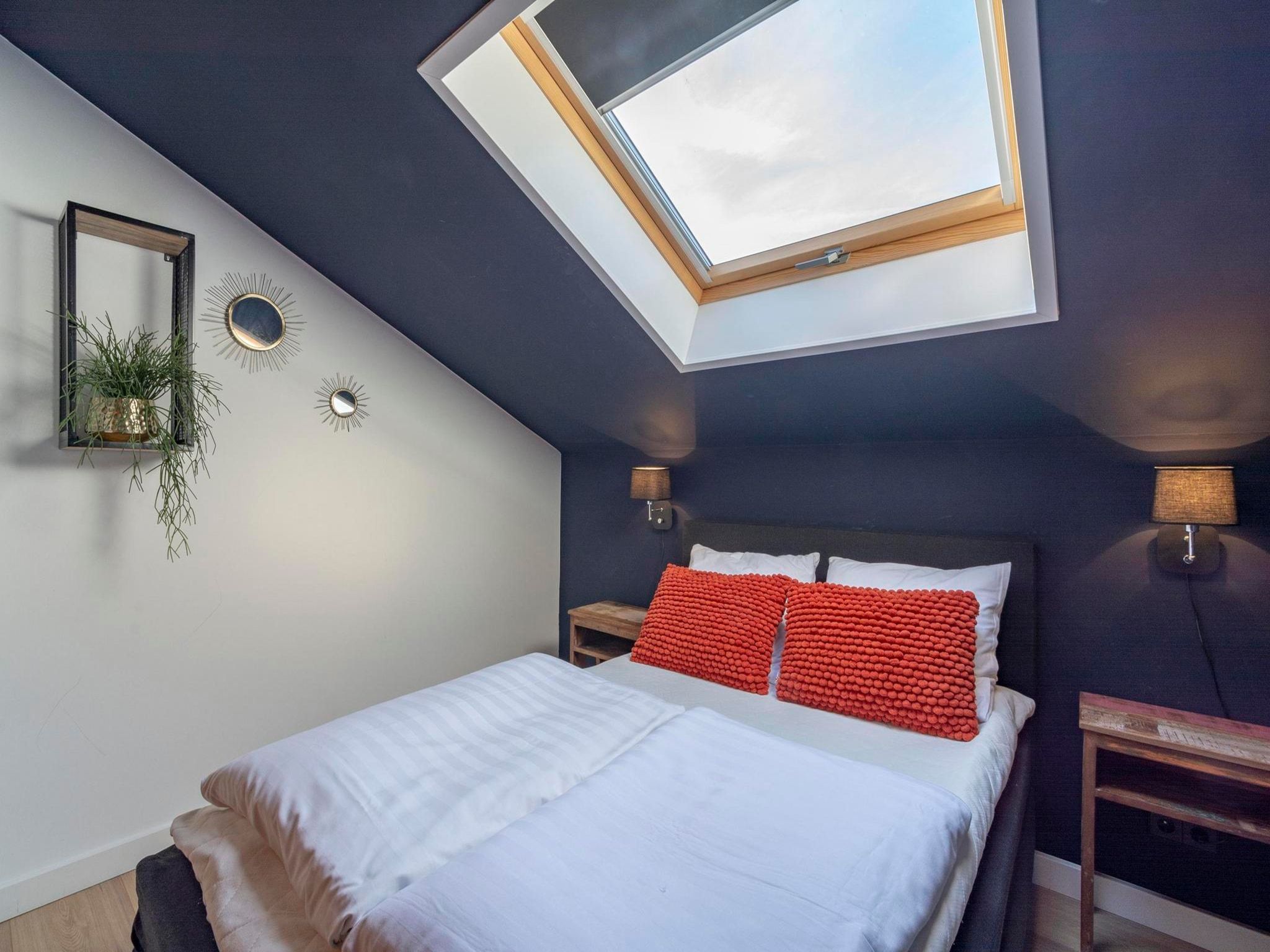 Een slaapkamer van Luxe Villa Keizerskroon - Keizerkroon 63 in Julianadorp aan Zee