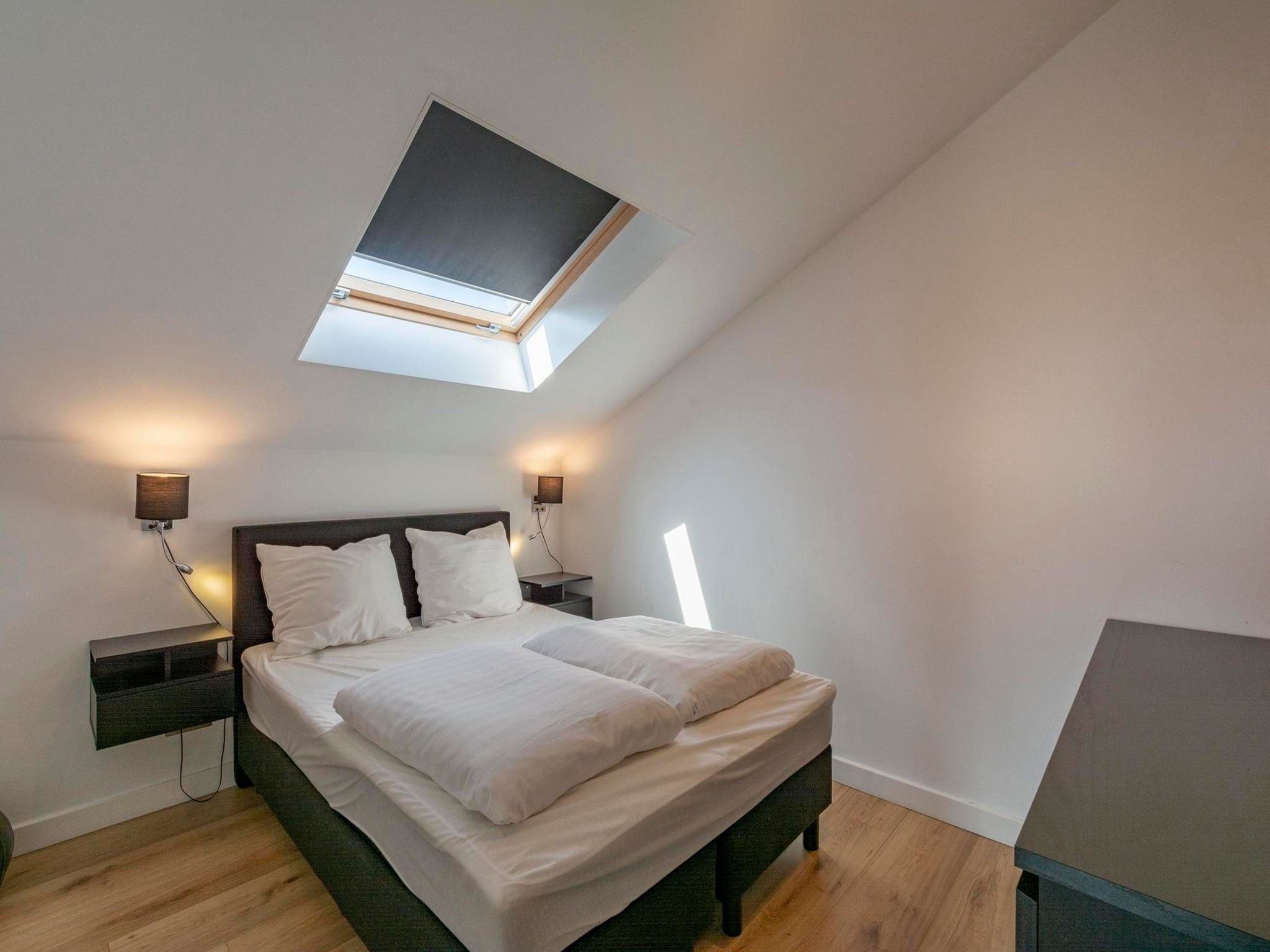 Een slaapkamer van Luxe Villa Keizerskroon - Keizerkroon 63 in Julianadorp aan Zee