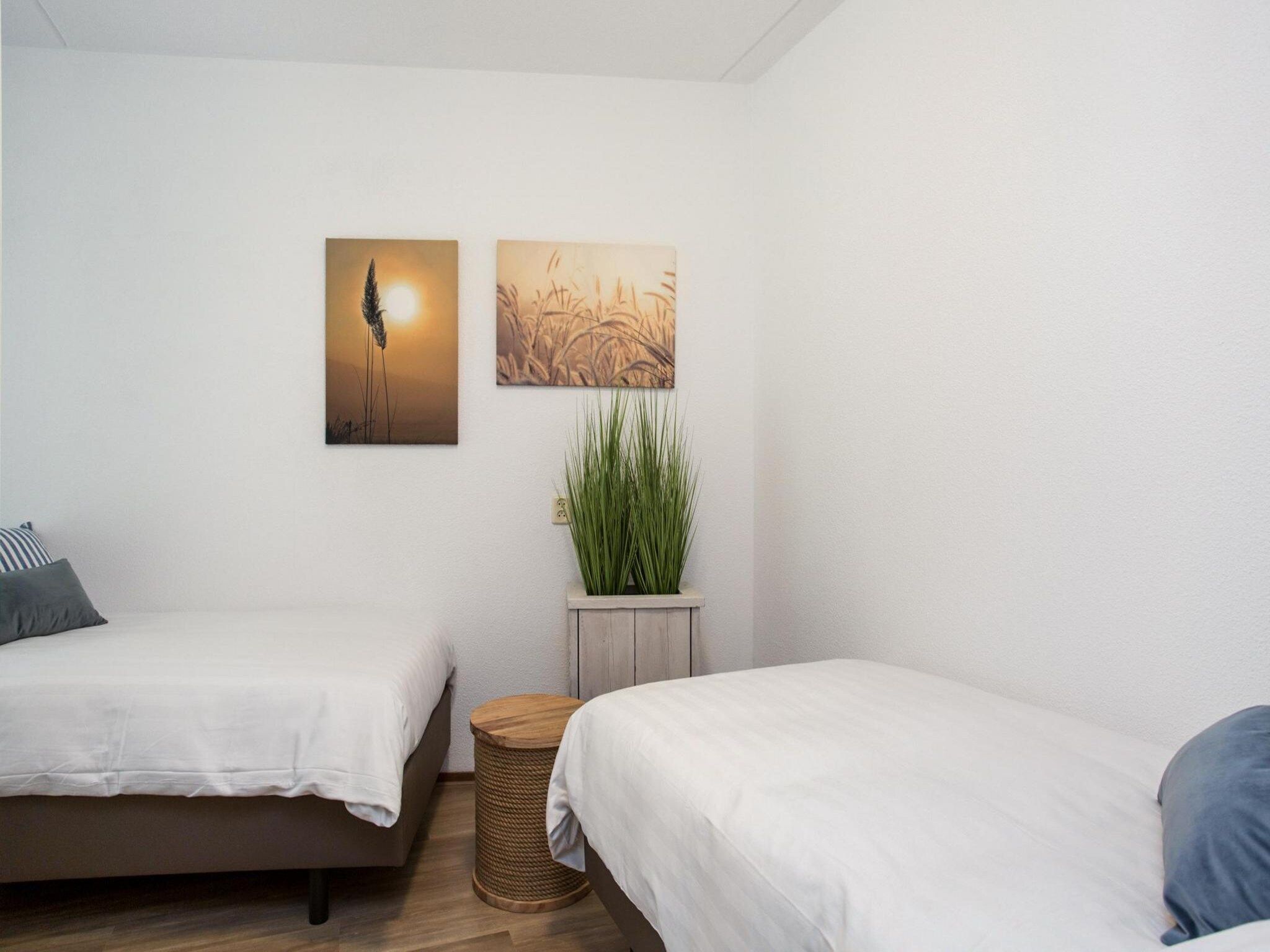 Een slaapkamer van Résidence Juliana 57 in Julianadorp aan Zee