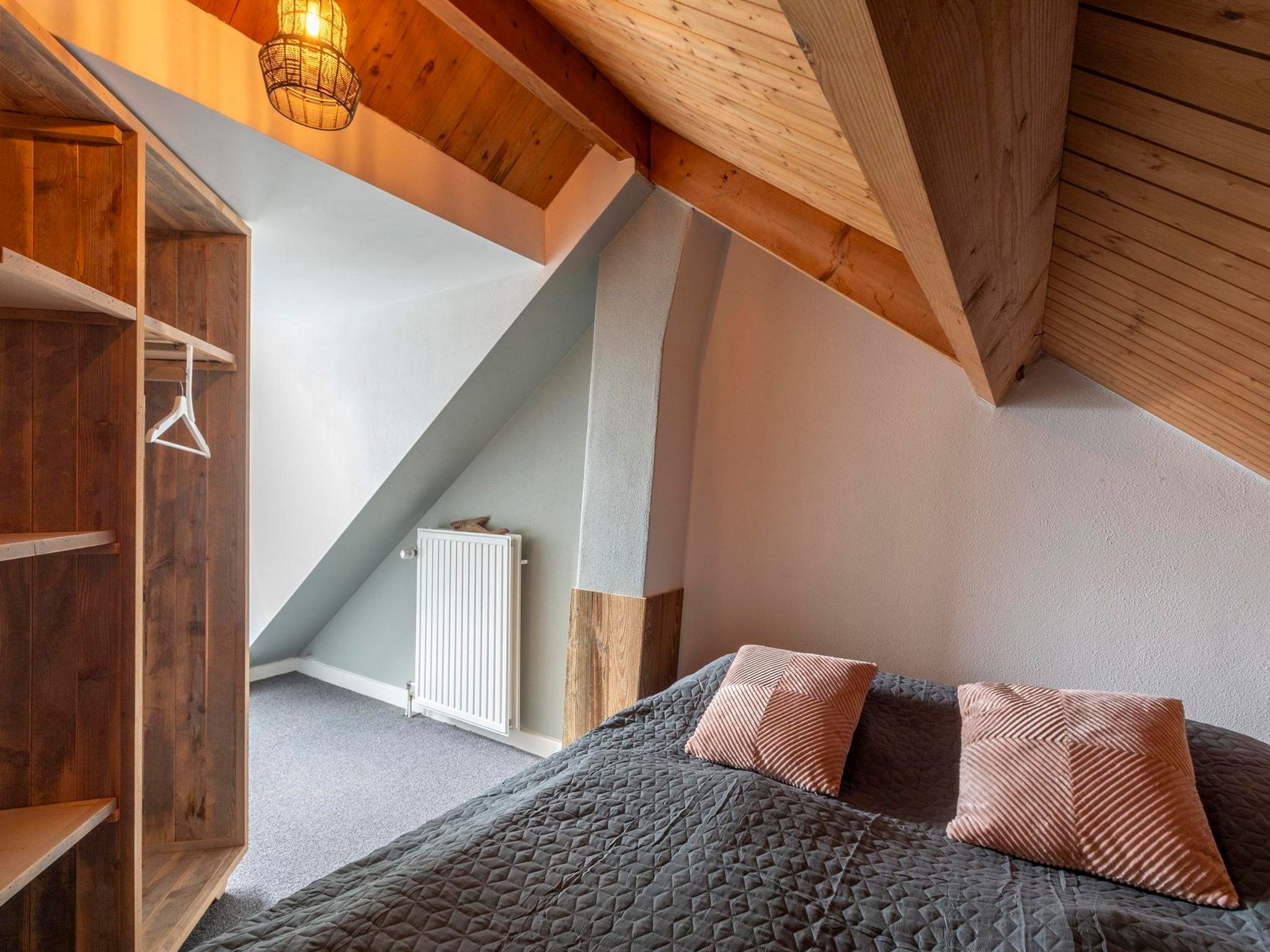 Een slaapkamer van Villa Zuidwester in Callantsoog