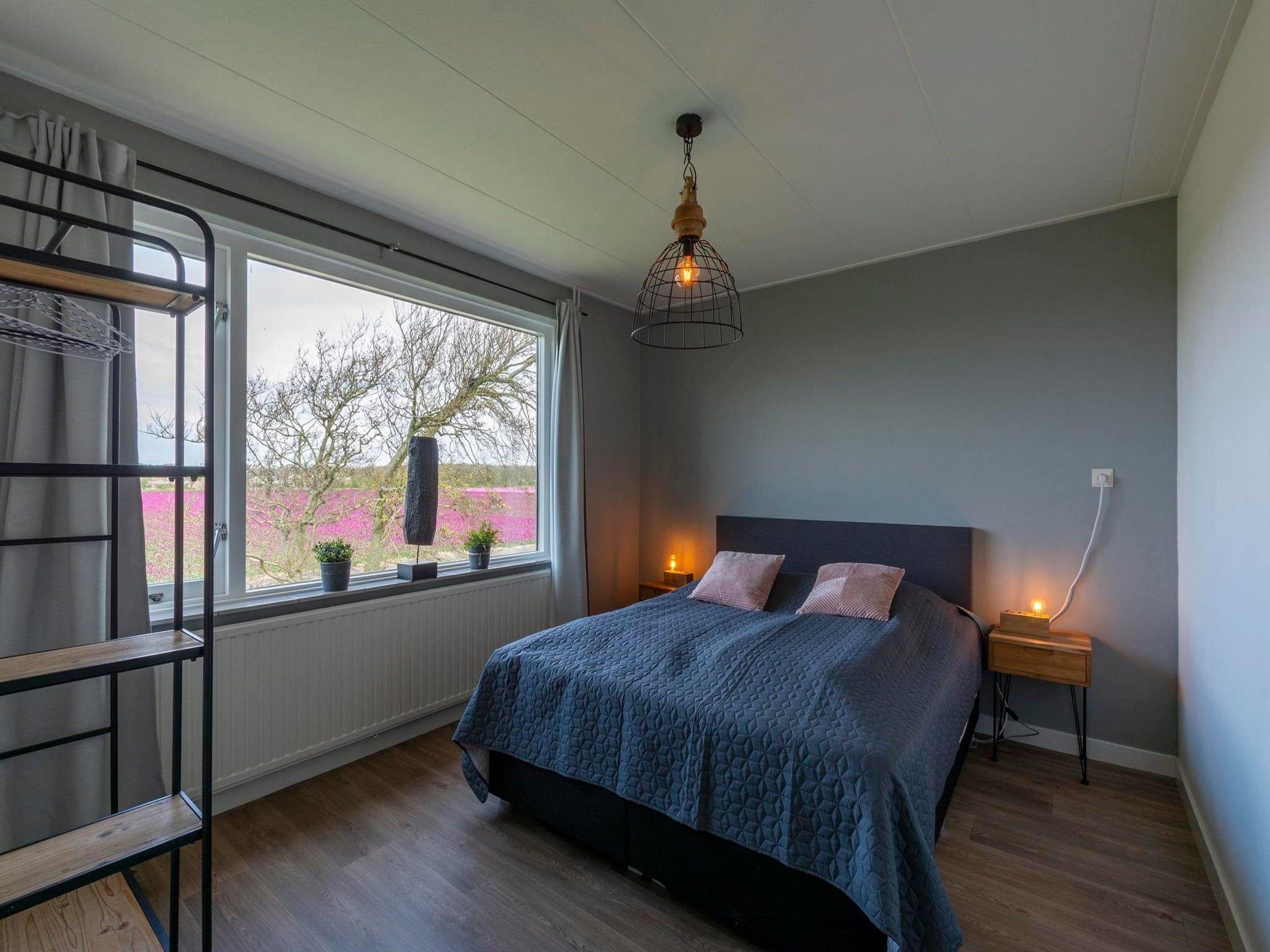 Een slaapkamer van Villa Zuidwester in Callantsoog