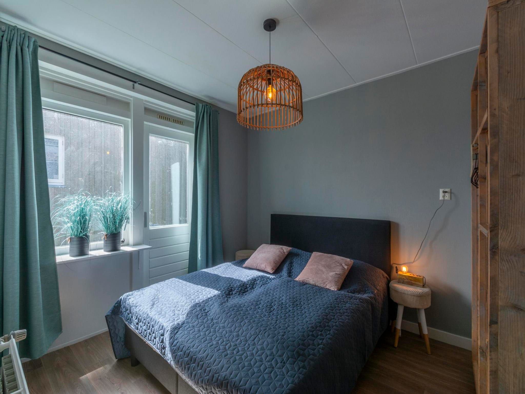Een slaapkamer van Villa Zuidwester in Callantsoog