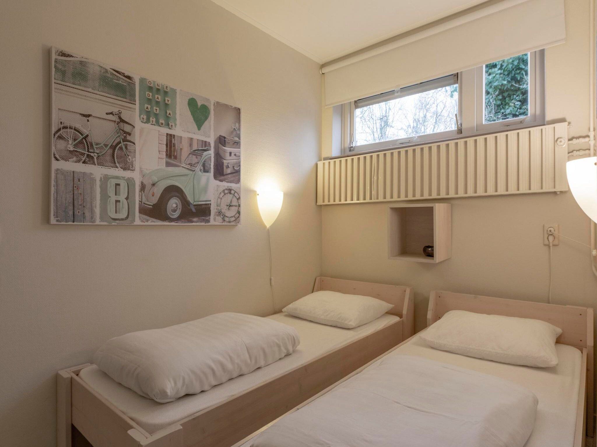 Een slaapkamer van Duinland 181 in Sint Maartenszee