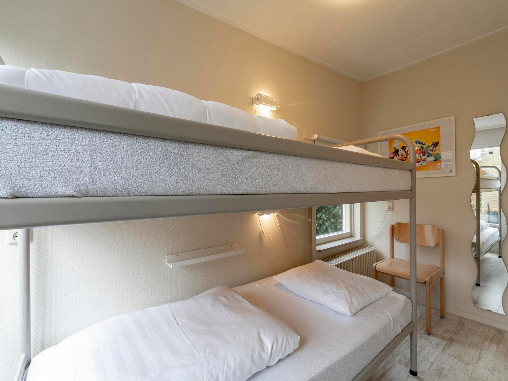 Een slaapkamer van Duinland 181 in Sint Maartenszee