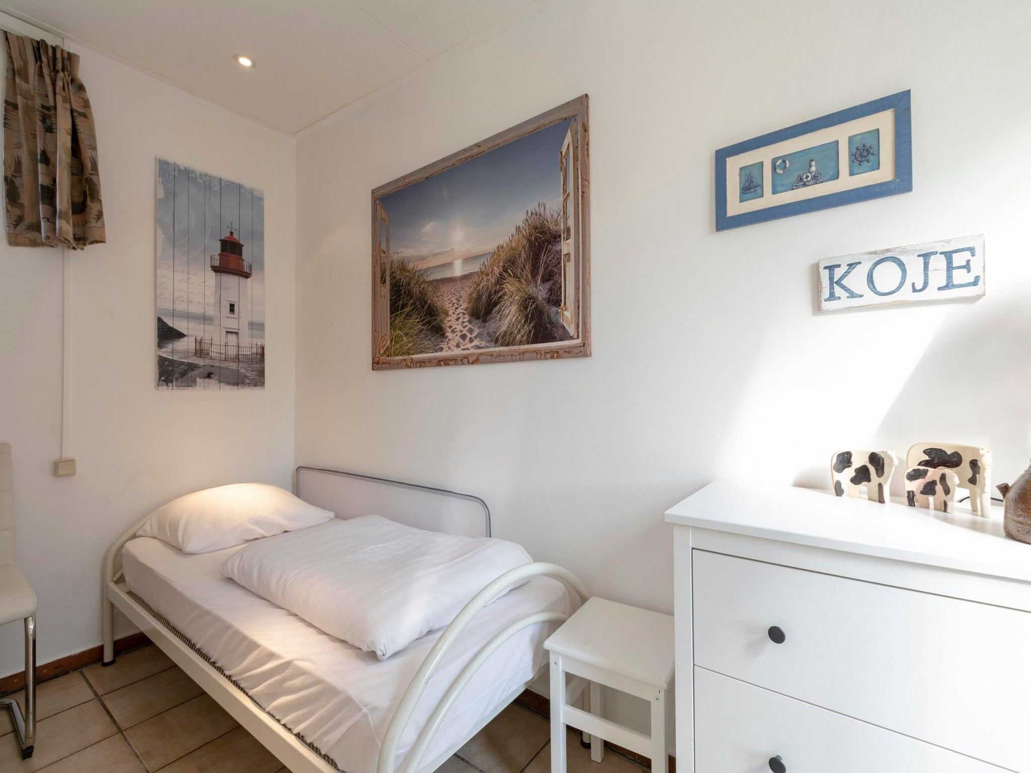 Een slaapkamer van Duinland 183 in Sint Maartenszee