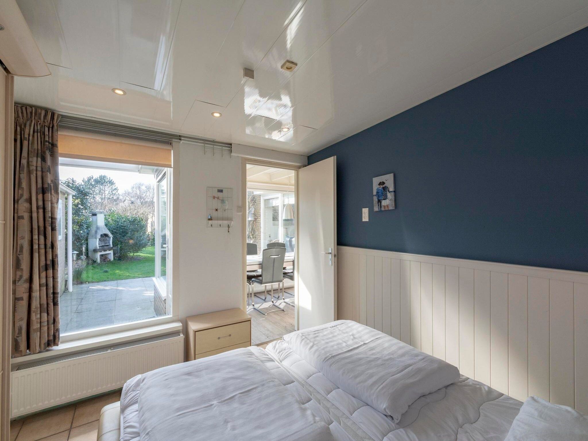 Een slaapkamer van Duinland 183 in Sint Maartenszee