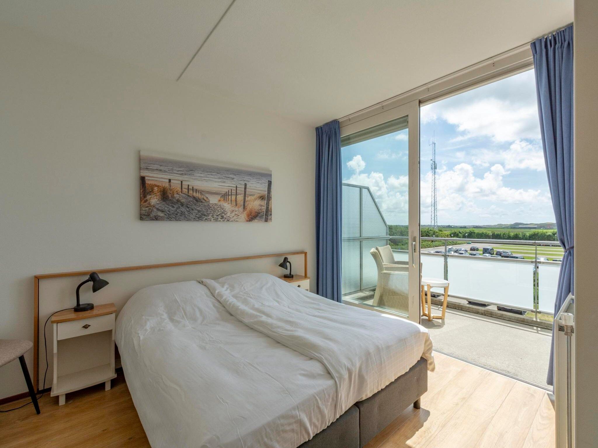 Een slaapkamer van Duinerei B202 in Groote Keeten