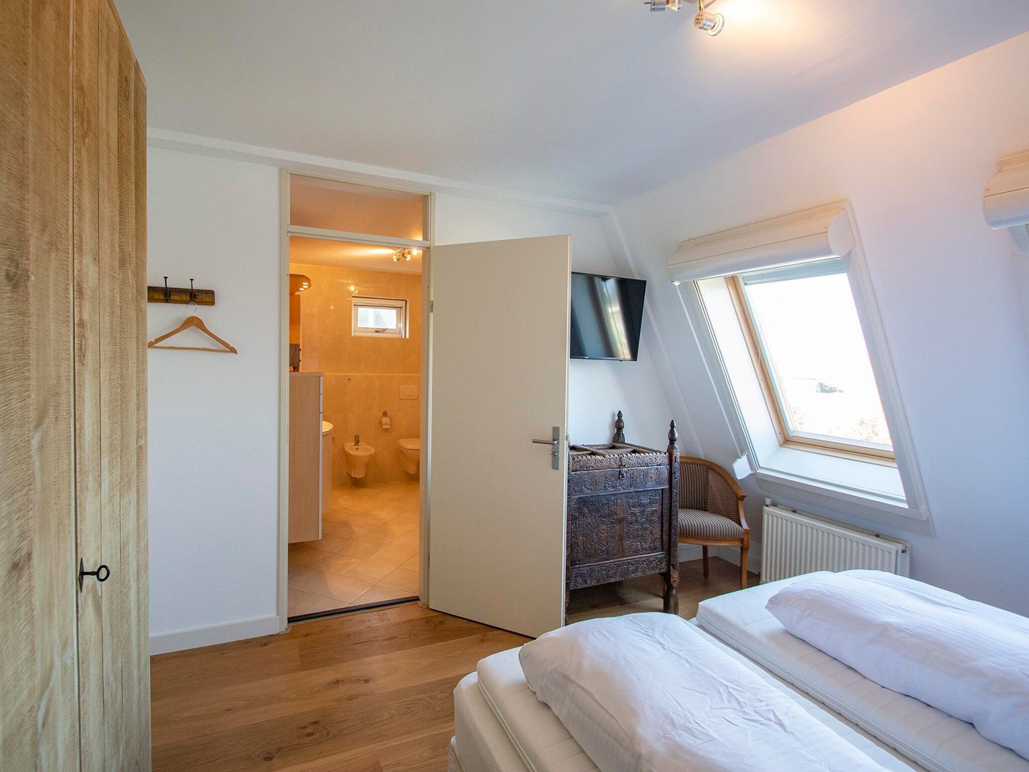 Een slaapkamer van Duinerei C301/C302 in Groote Keeten