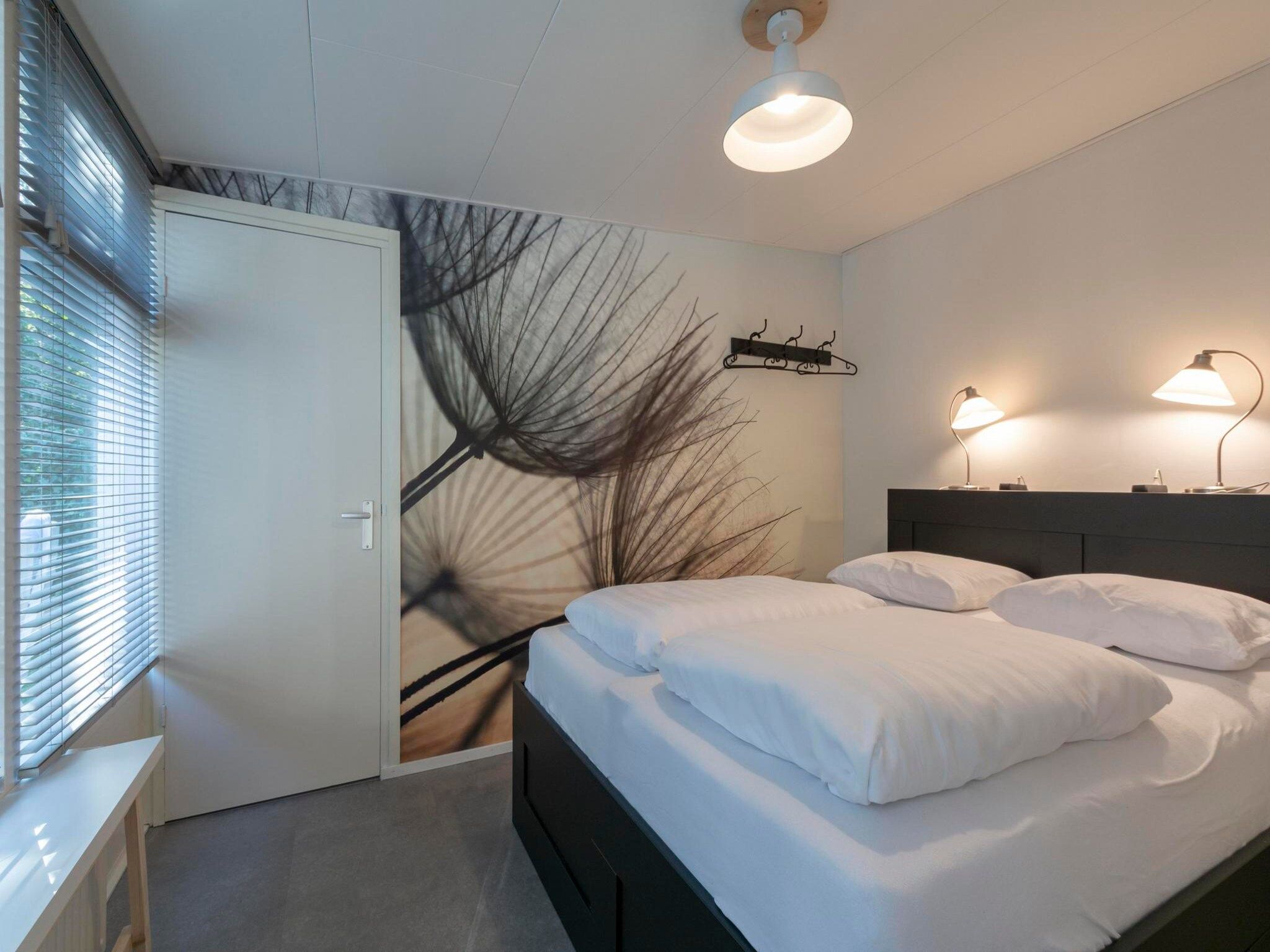 Een slaapkamer van Duinland 110 in Sint Maartenszee