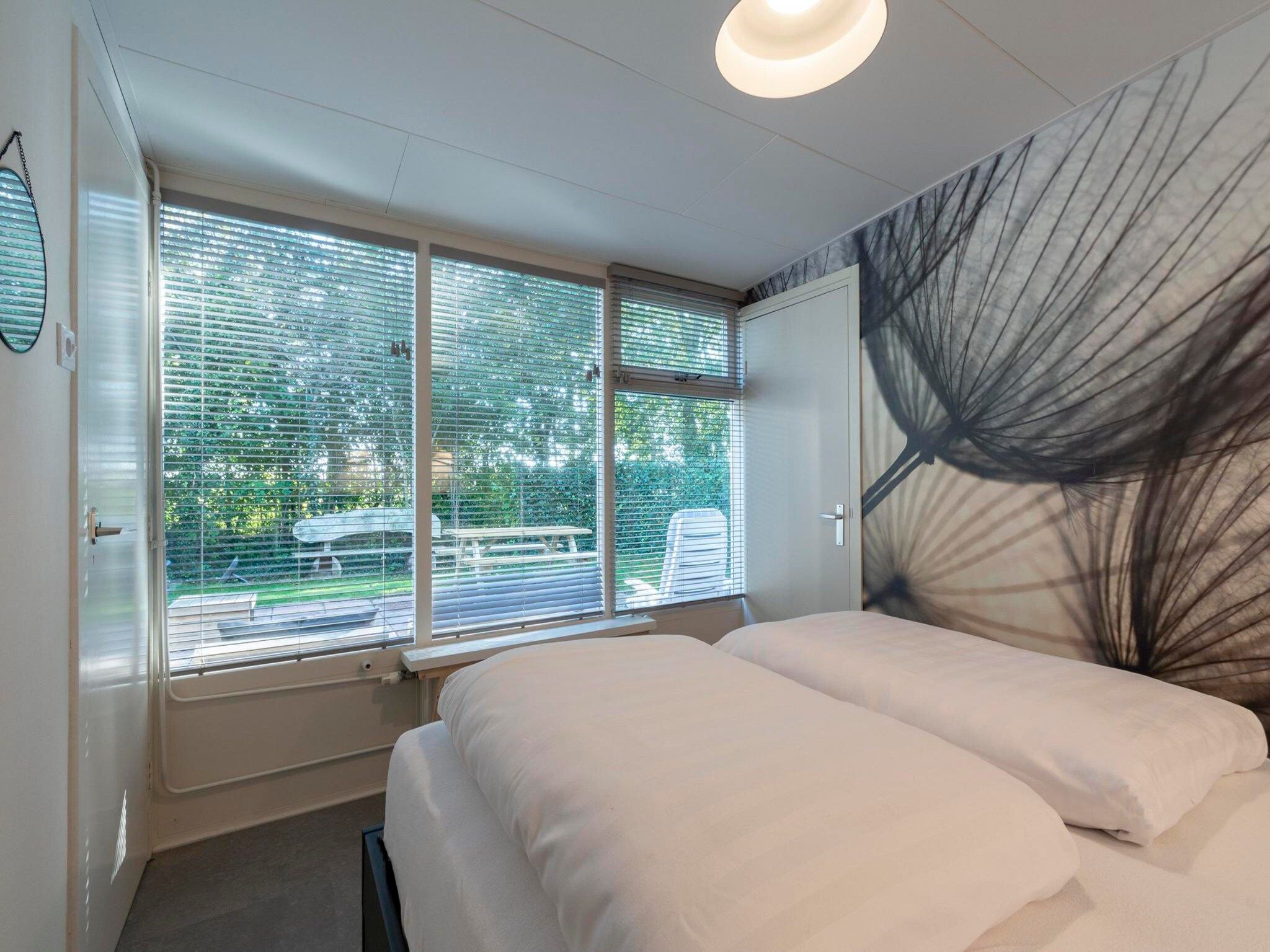 Een slaapkamer van Duinland 110 in Sint Maartenszee