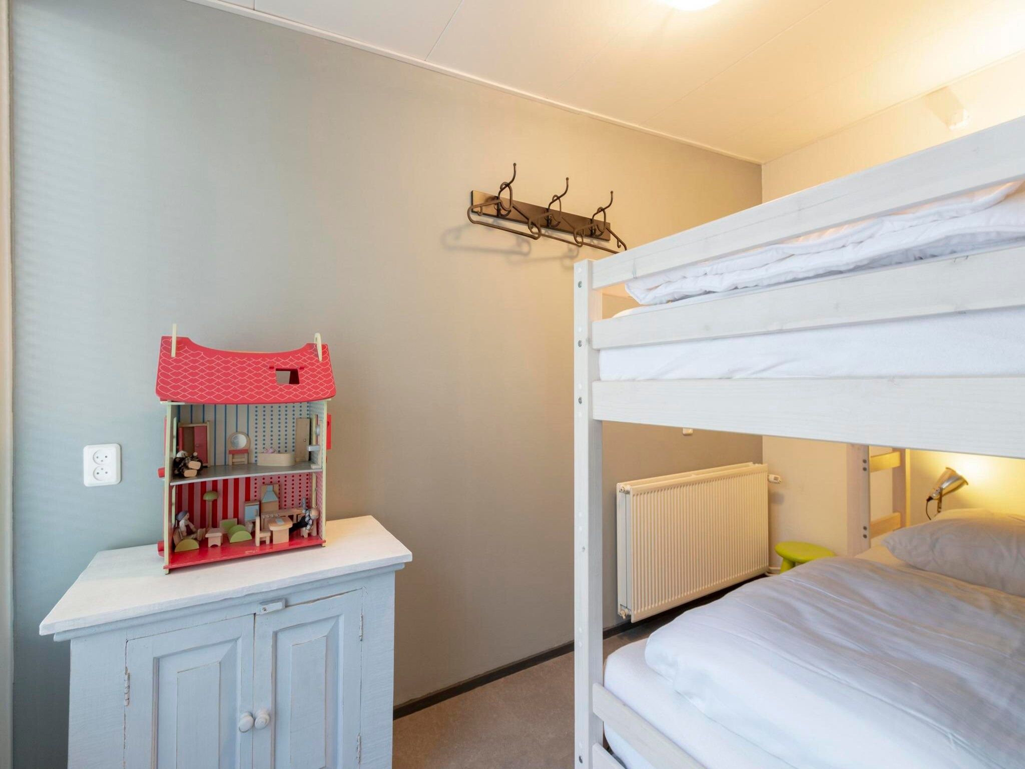 Een slaapkamer van Duinland 110 in Sint Maartenszee