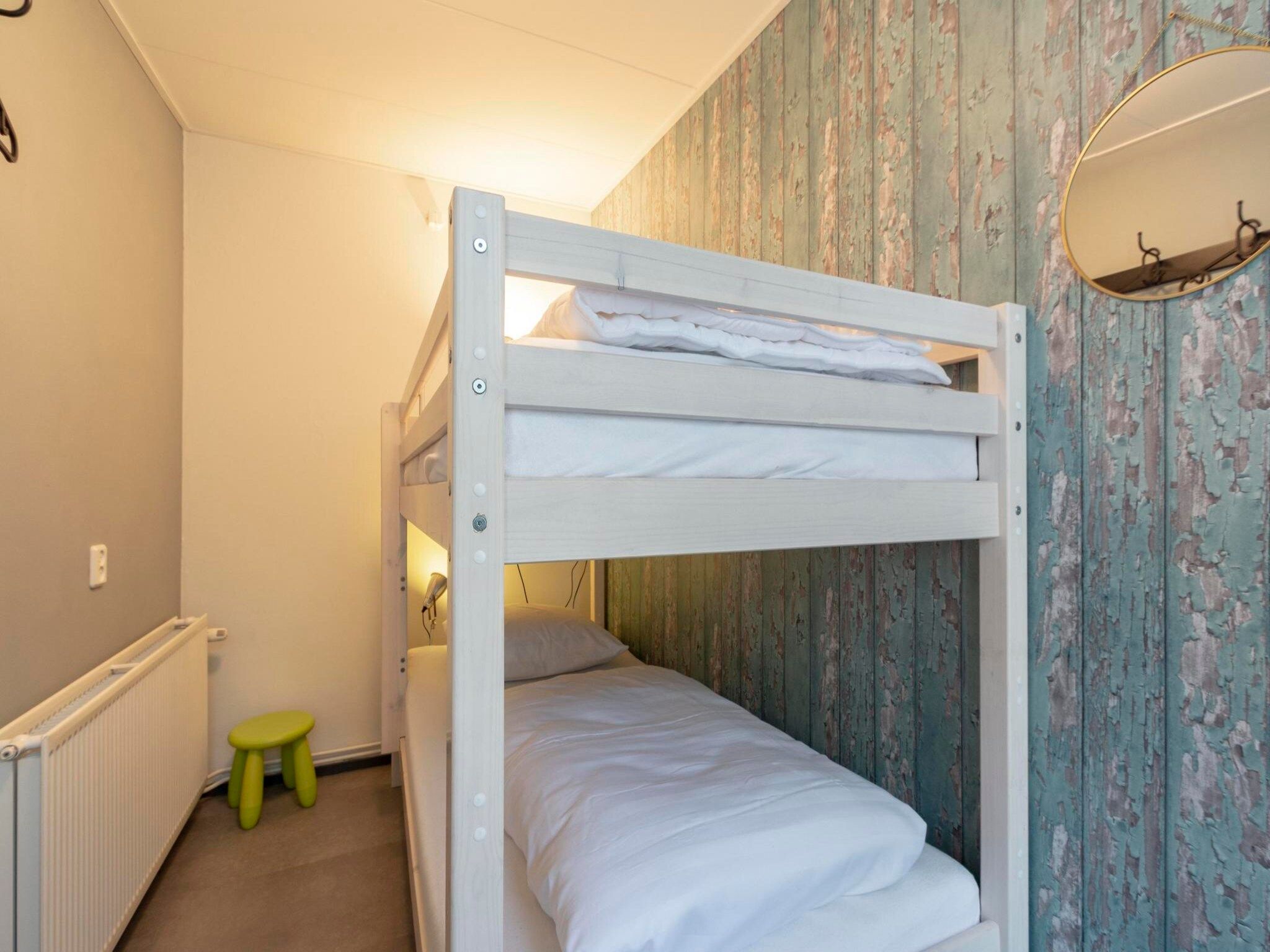 Een slaapkamer van Duinland 110 in Sint Maartenszee