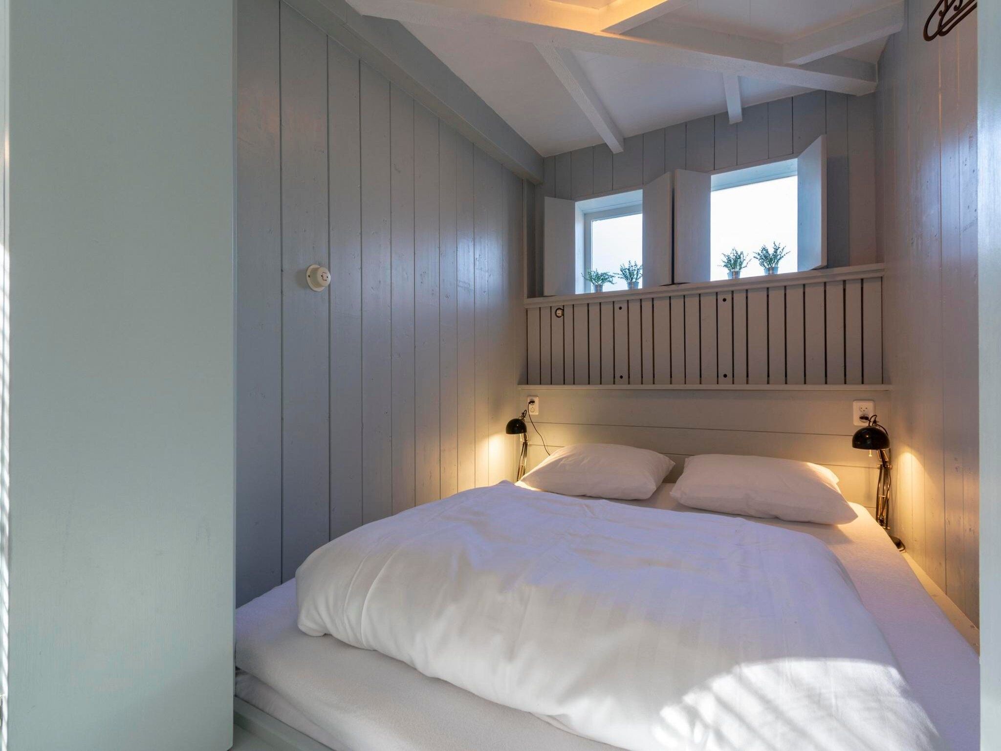 Een slaapkamer van Duinland 110 in Sint Maartenszee