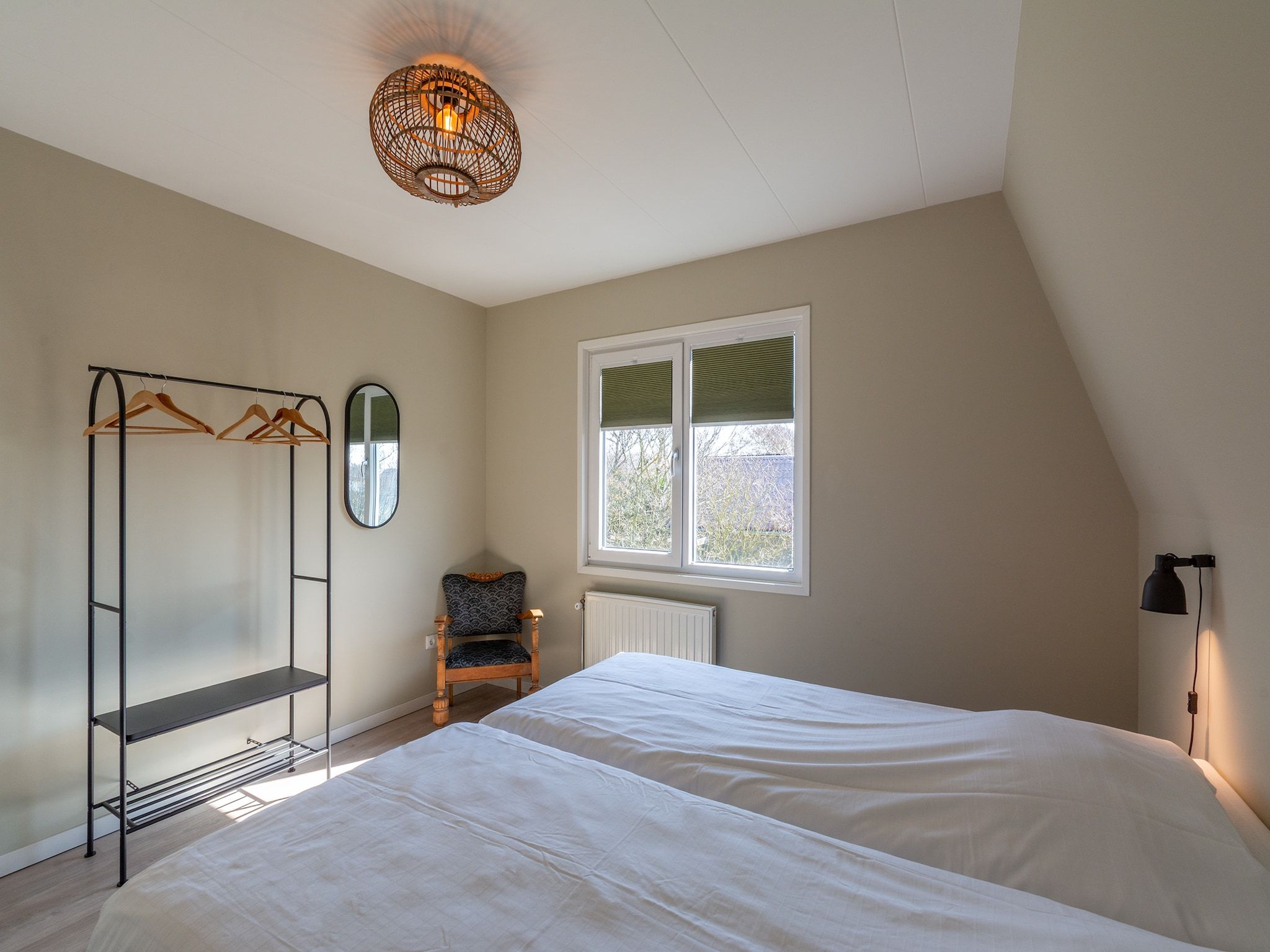 Een slaapkamer van Garnekuul 6 in Callantsoog