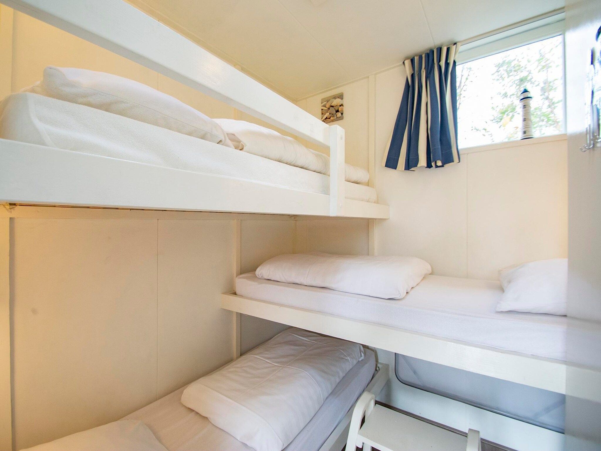 Een slaapkamer van Garnekuul 81 in Callantsoog