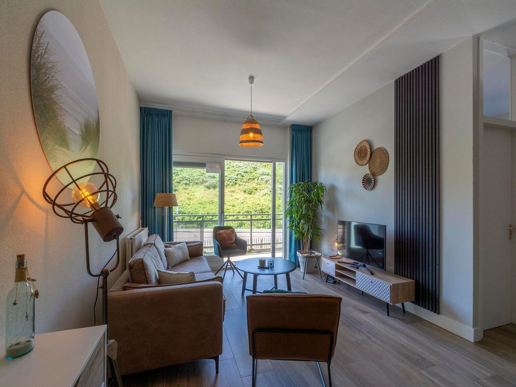 De woonkamer van Wijde Blick 112 in Callantsoog