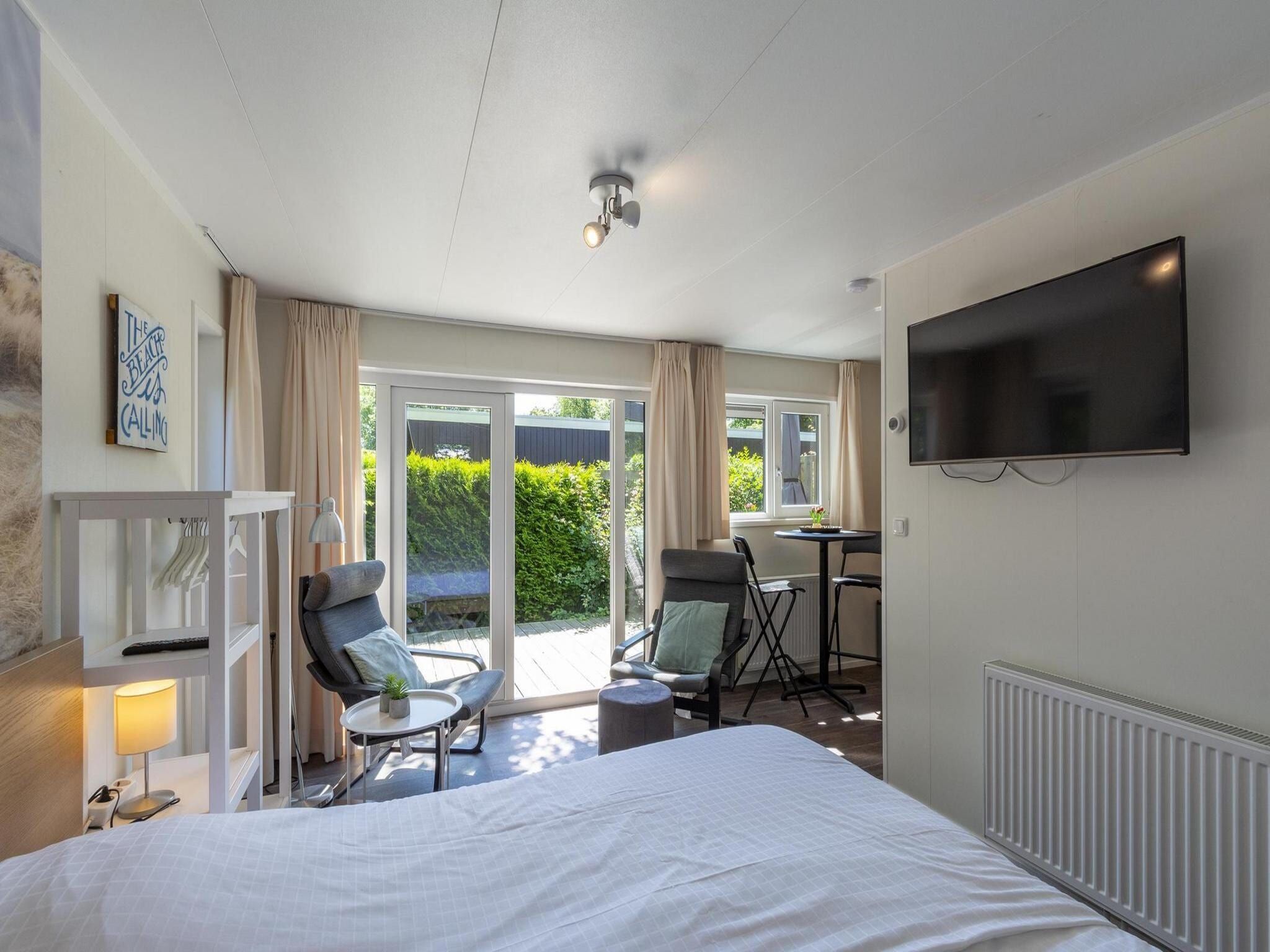 Een slaapkamer van Beach Studio Campanula in Sint Maartenszee