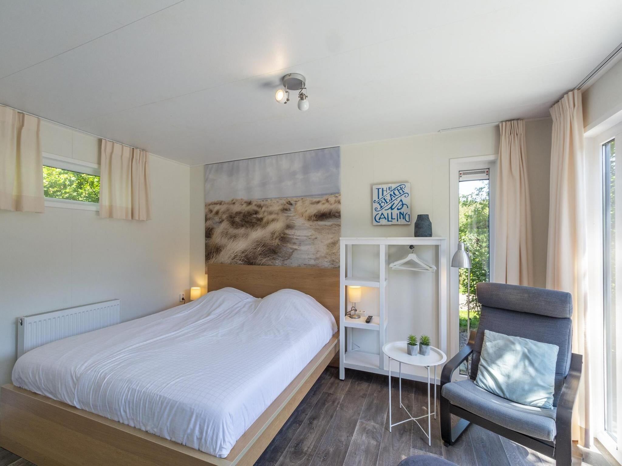 Een slaapkamer van Beach Studio Campanula in Sint Maartenszee