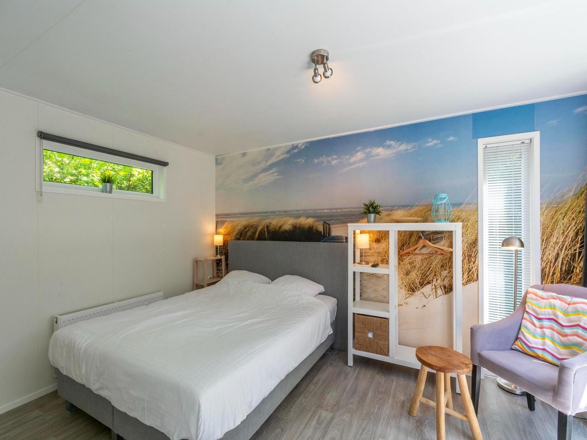 Een slaapkamer van Beach Studio Campanula in Sint Maartenszee