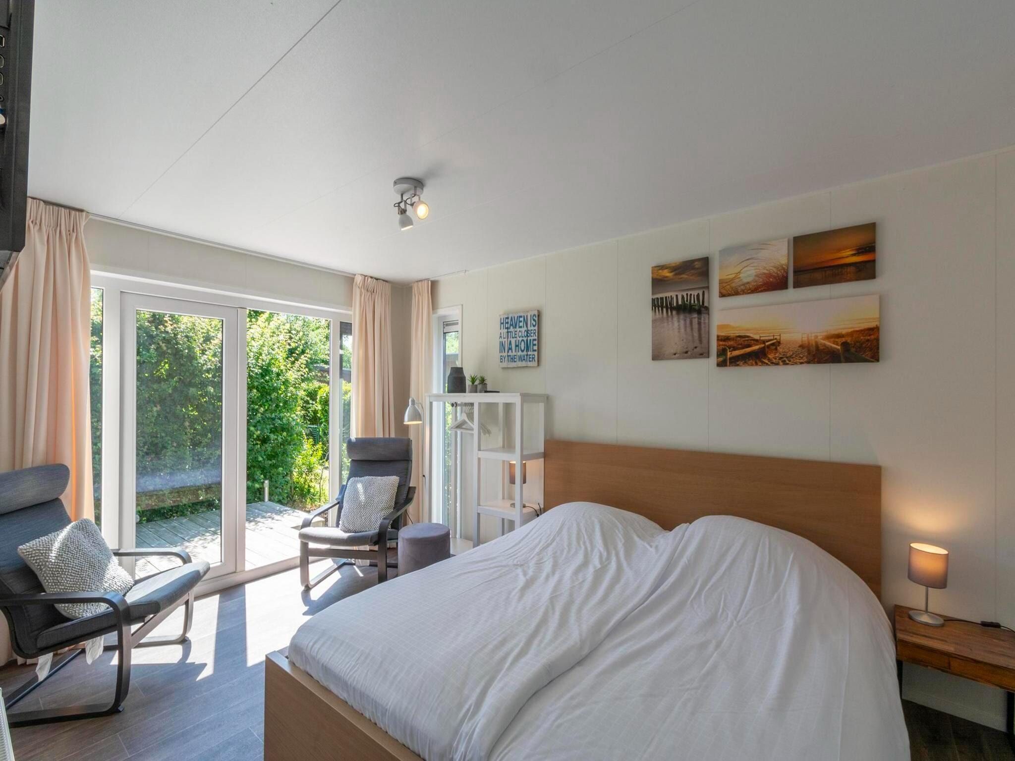 Een slaapkamer van Beach Studio Campanula in Sint Maartenszee