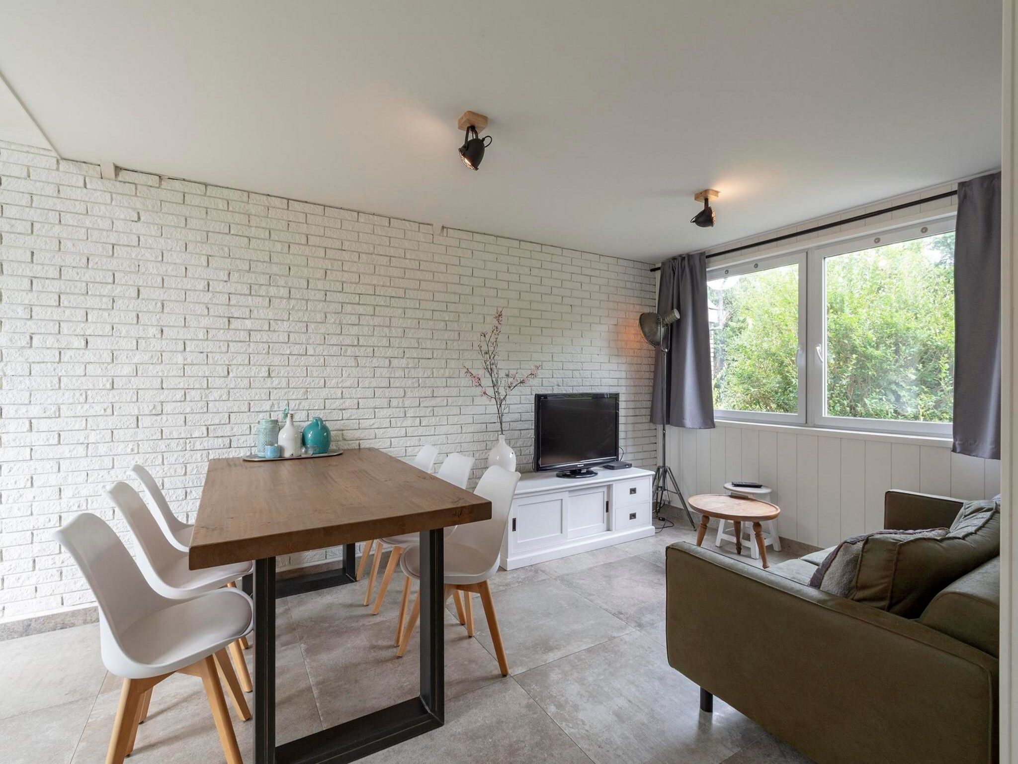 De woonkamer van Belkmerduinen 12 in Sint Maartenszee