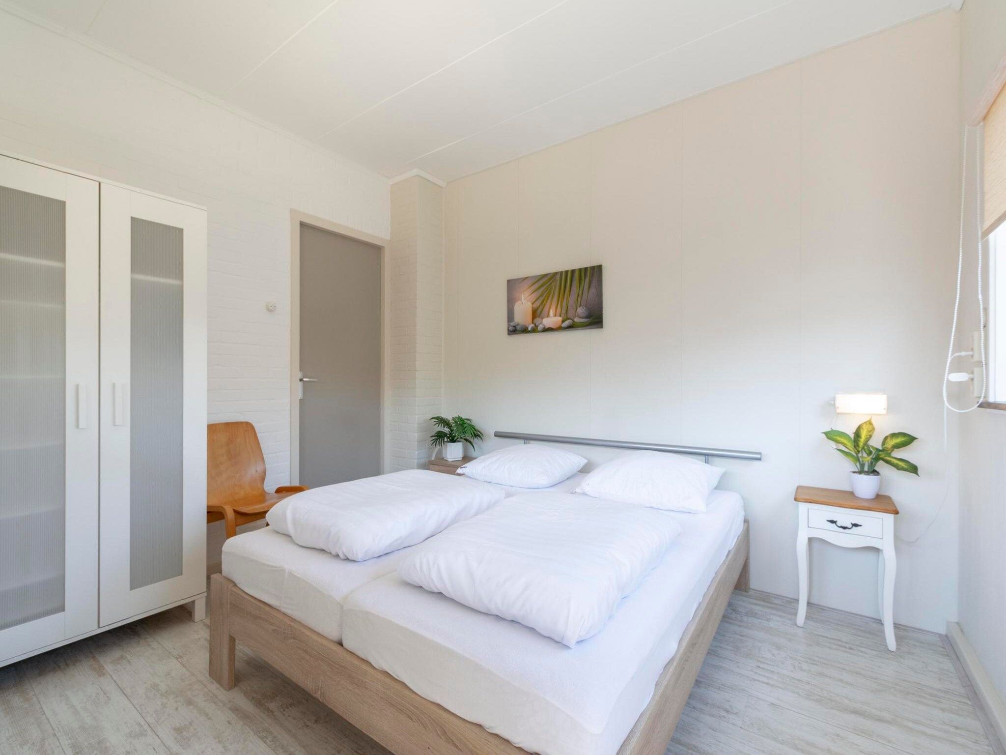 Een slaapkamer van Zeewaard 33 in Sint Maartenszee