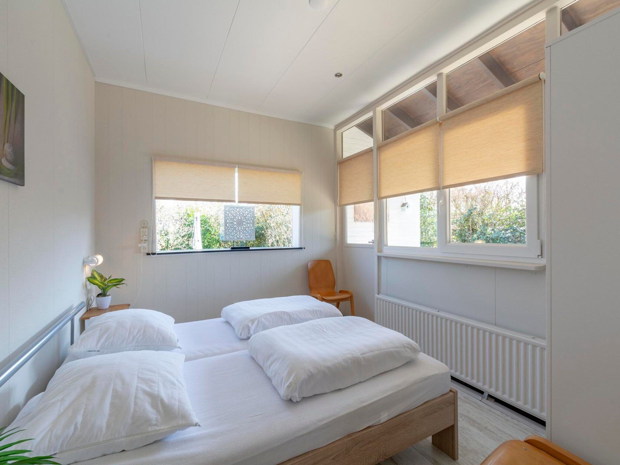 Een slaapkamer van Zeewaard 33 in Sint Maartenszee