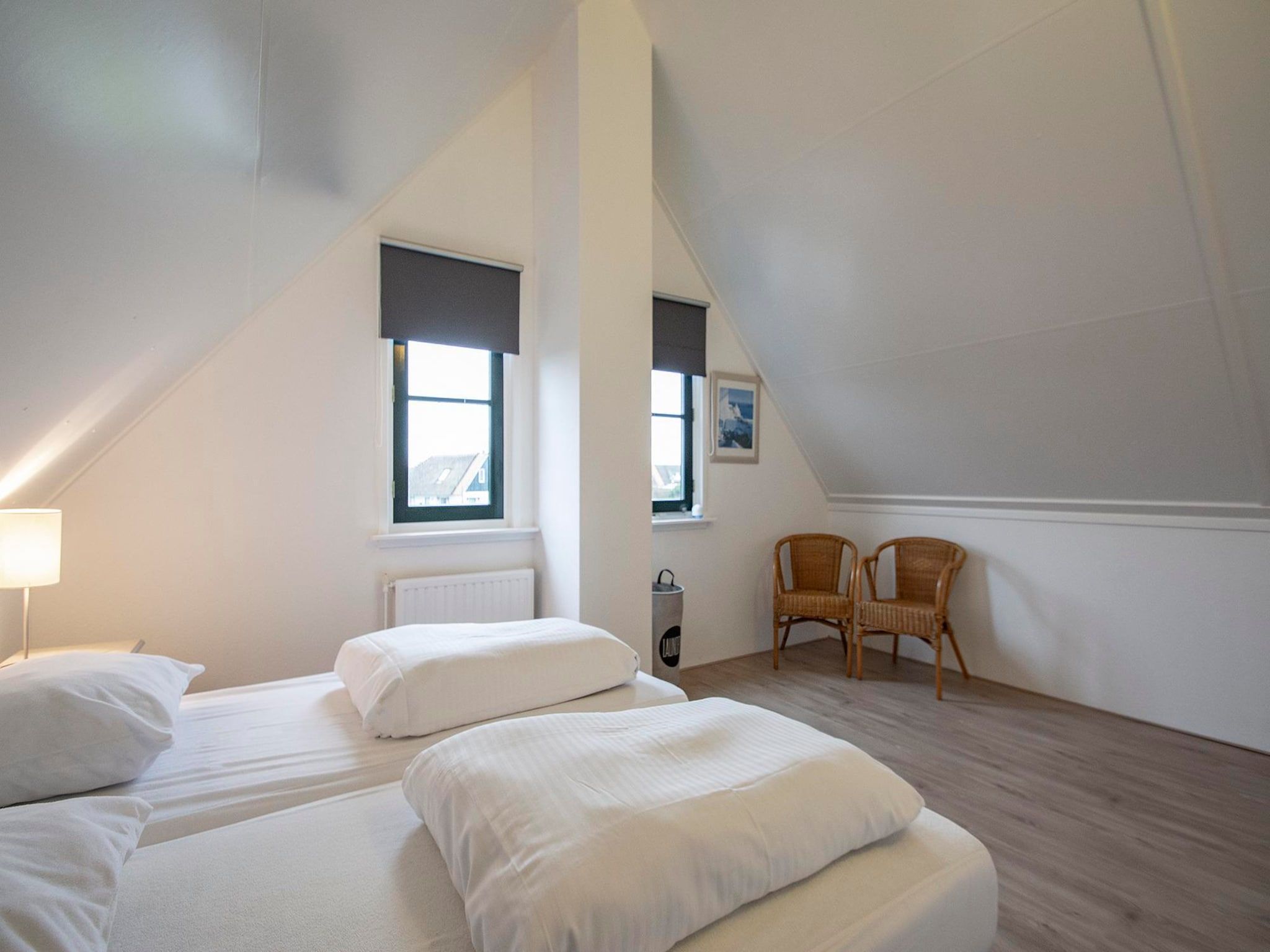 Een slaapkamer van De Buitenplaats 42 in Callantsoog