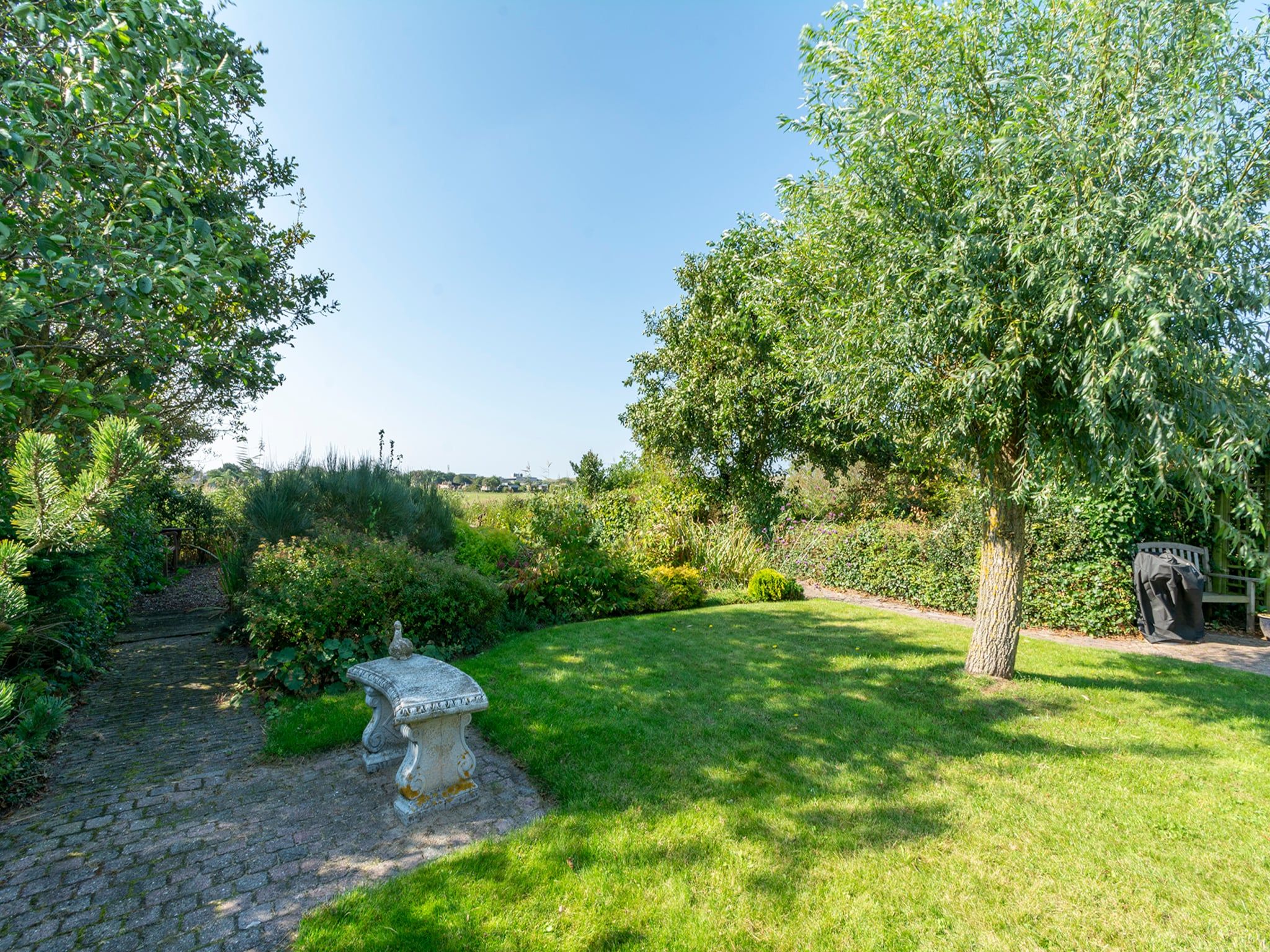 De tuin van De Buitenplaats 7 in Callantsoog