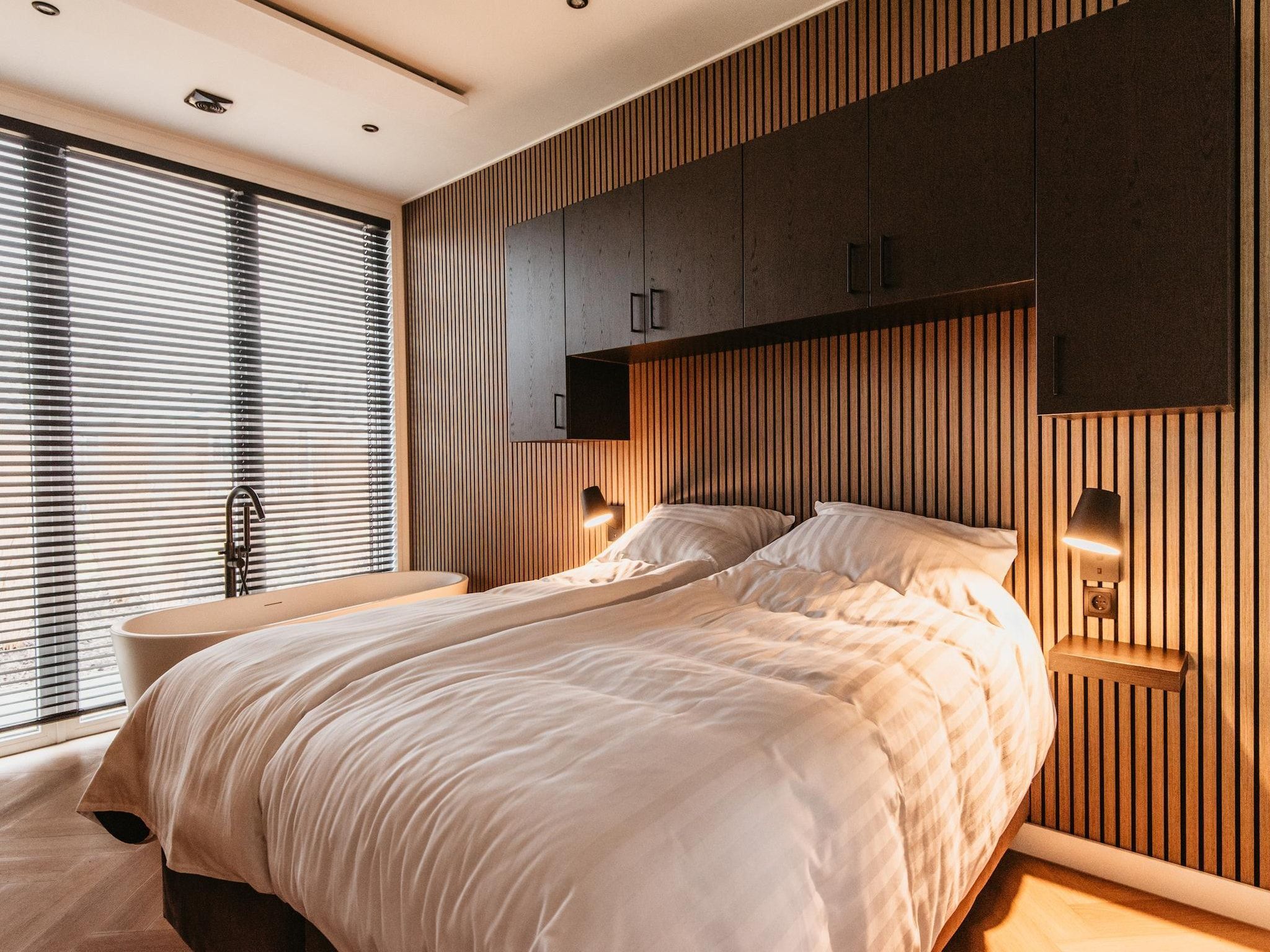 Een slaapkamer van Chalet aan het Water - Betuwse Hofjes - 4P in Kesteren