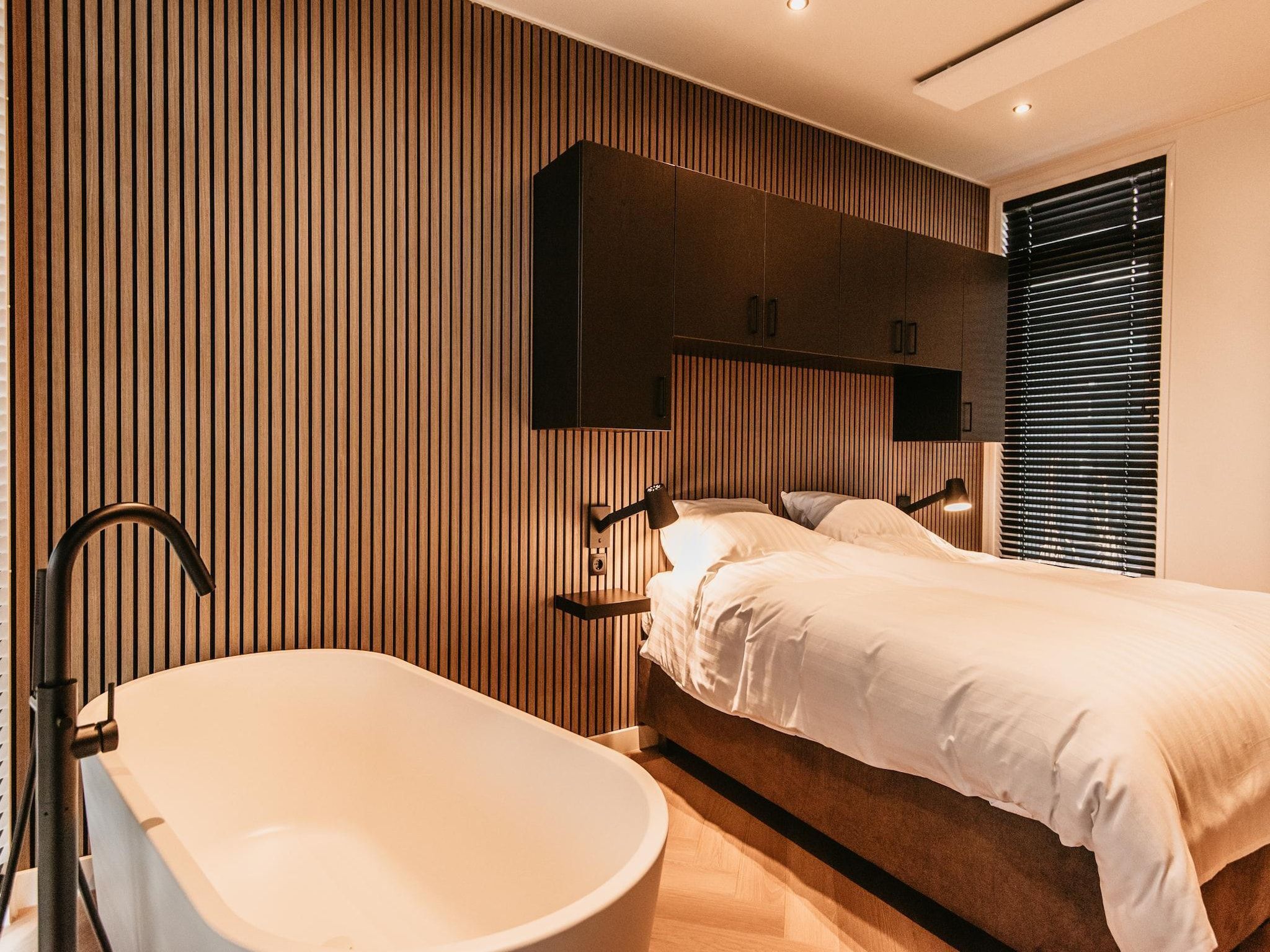 Een slaapkamer van Chalet aan het Water - Betuwse Hofjes - 4P in Kesteren